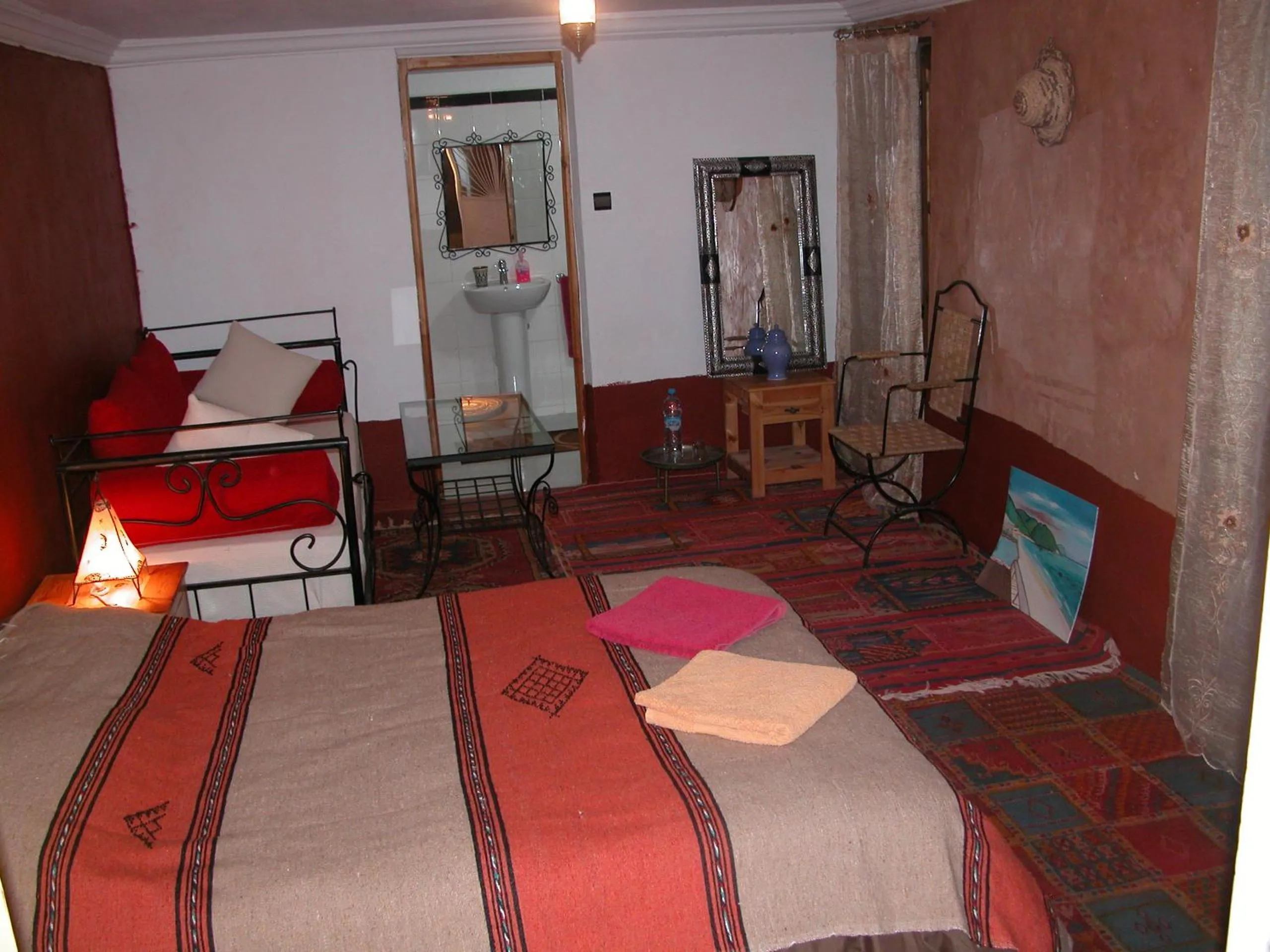 Living room, Bed in Kasbah Petit Nomade