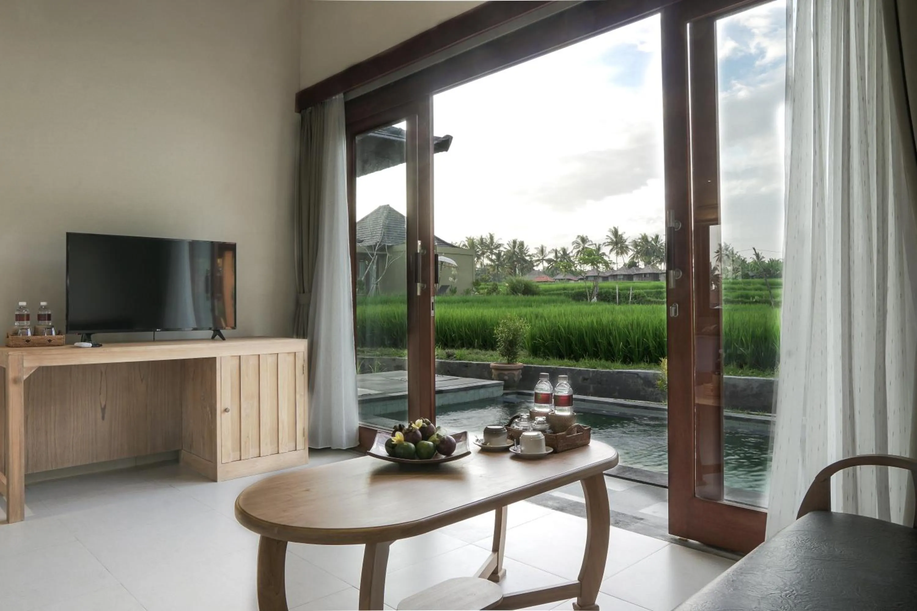 Communal lounge/ TV room in Masia Villa Ubud