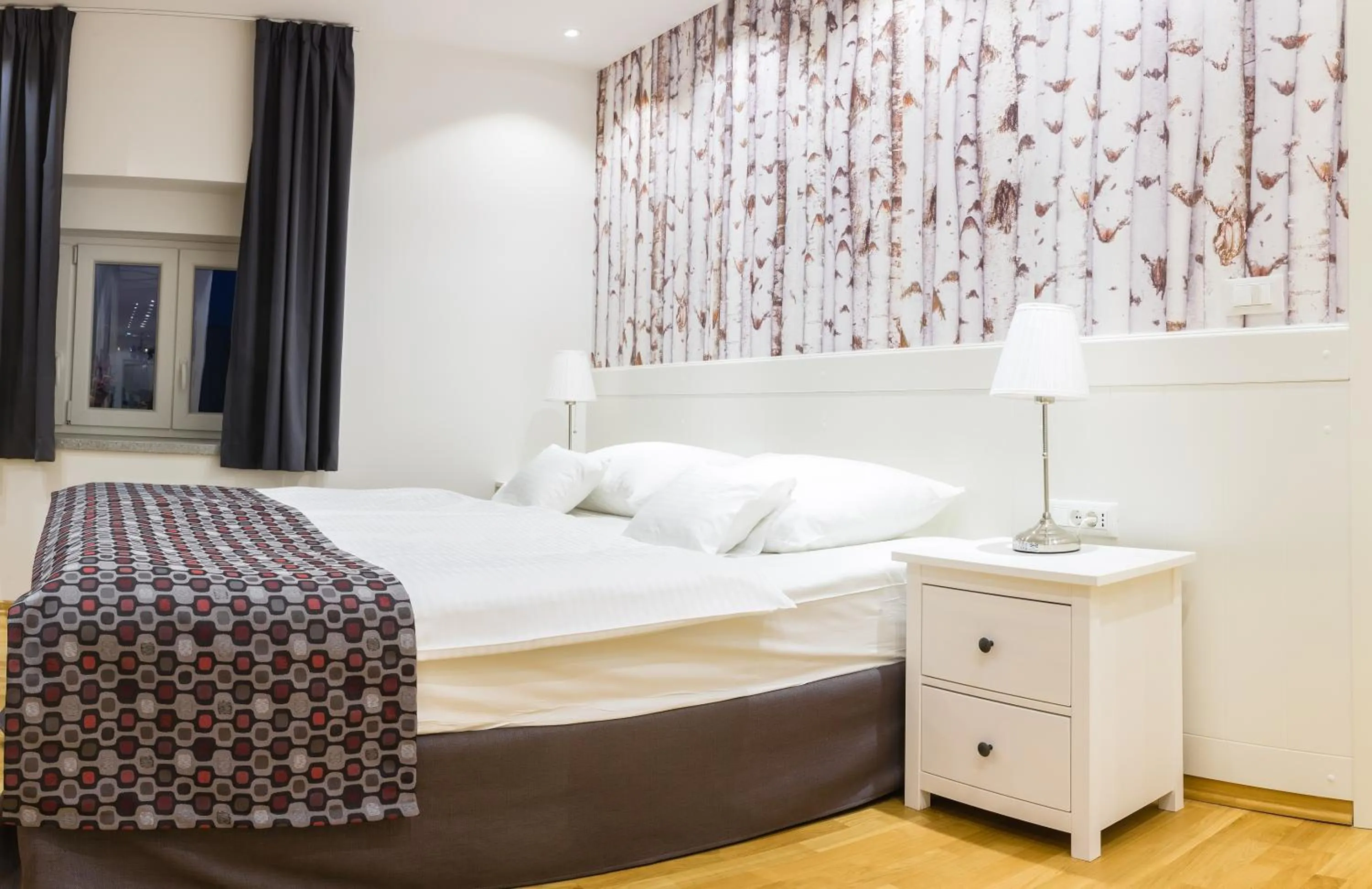 Bed in WH Apartments