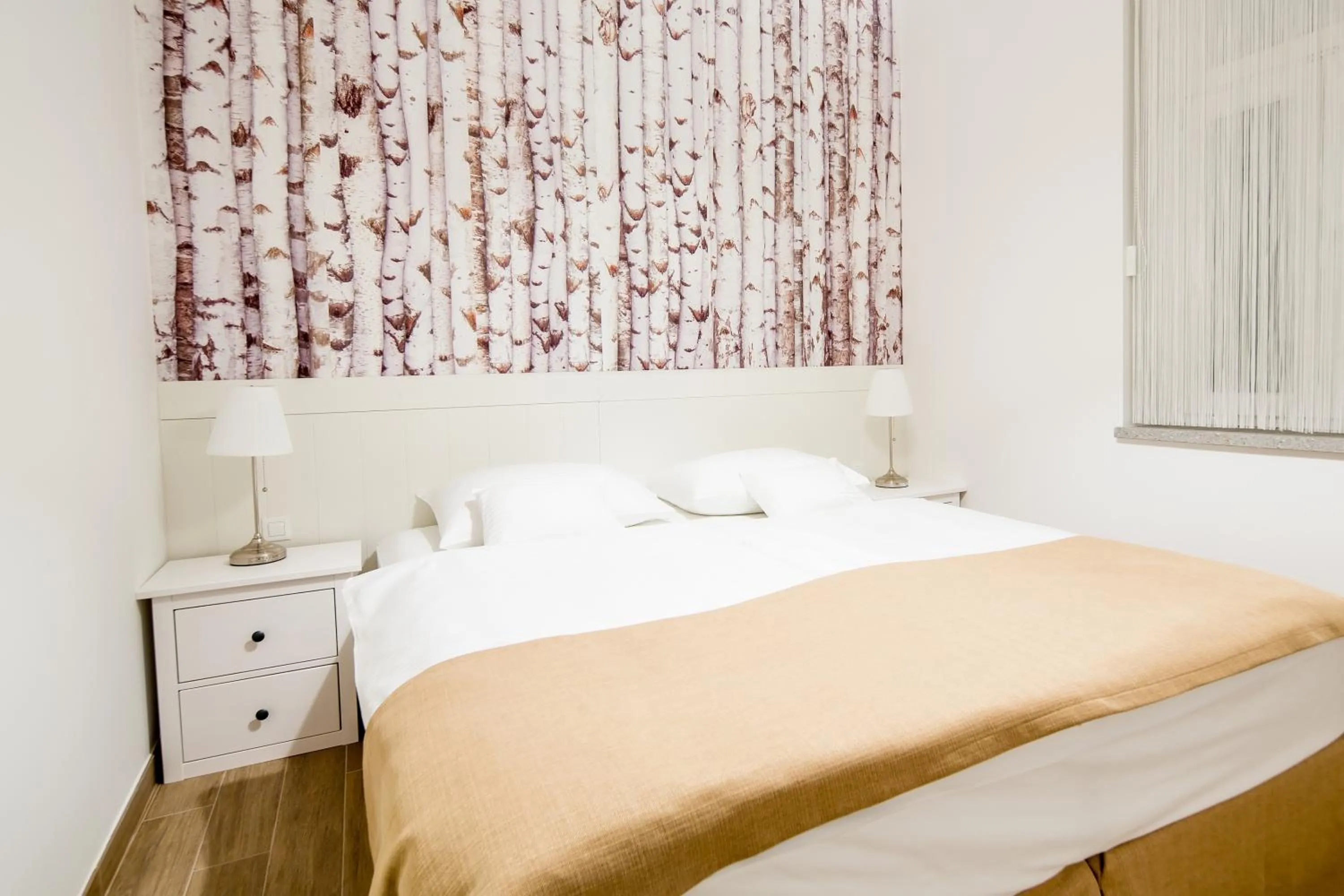 Bed in WH Apartments