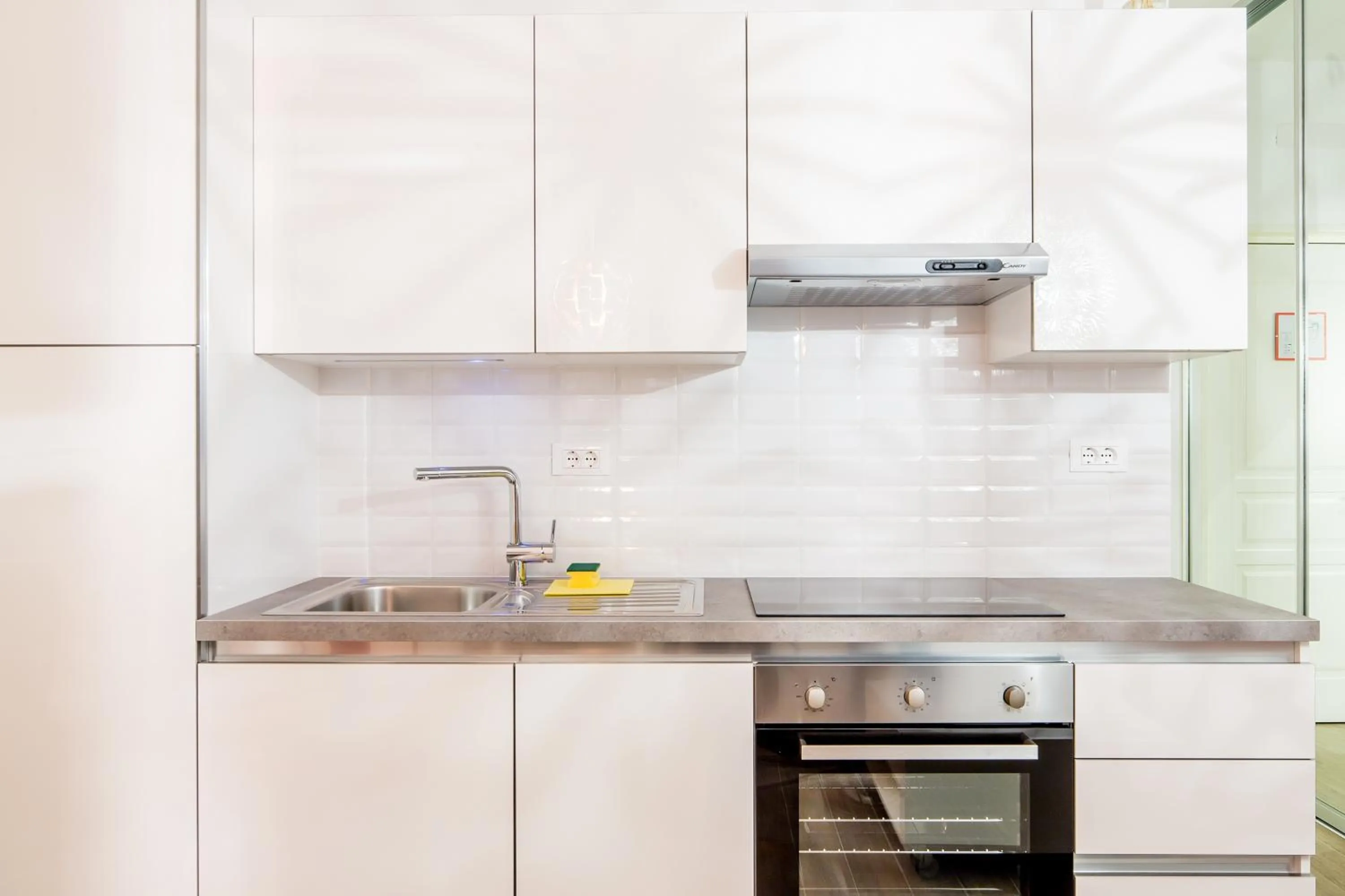 Kitchen or kitchenette in WH Apartments