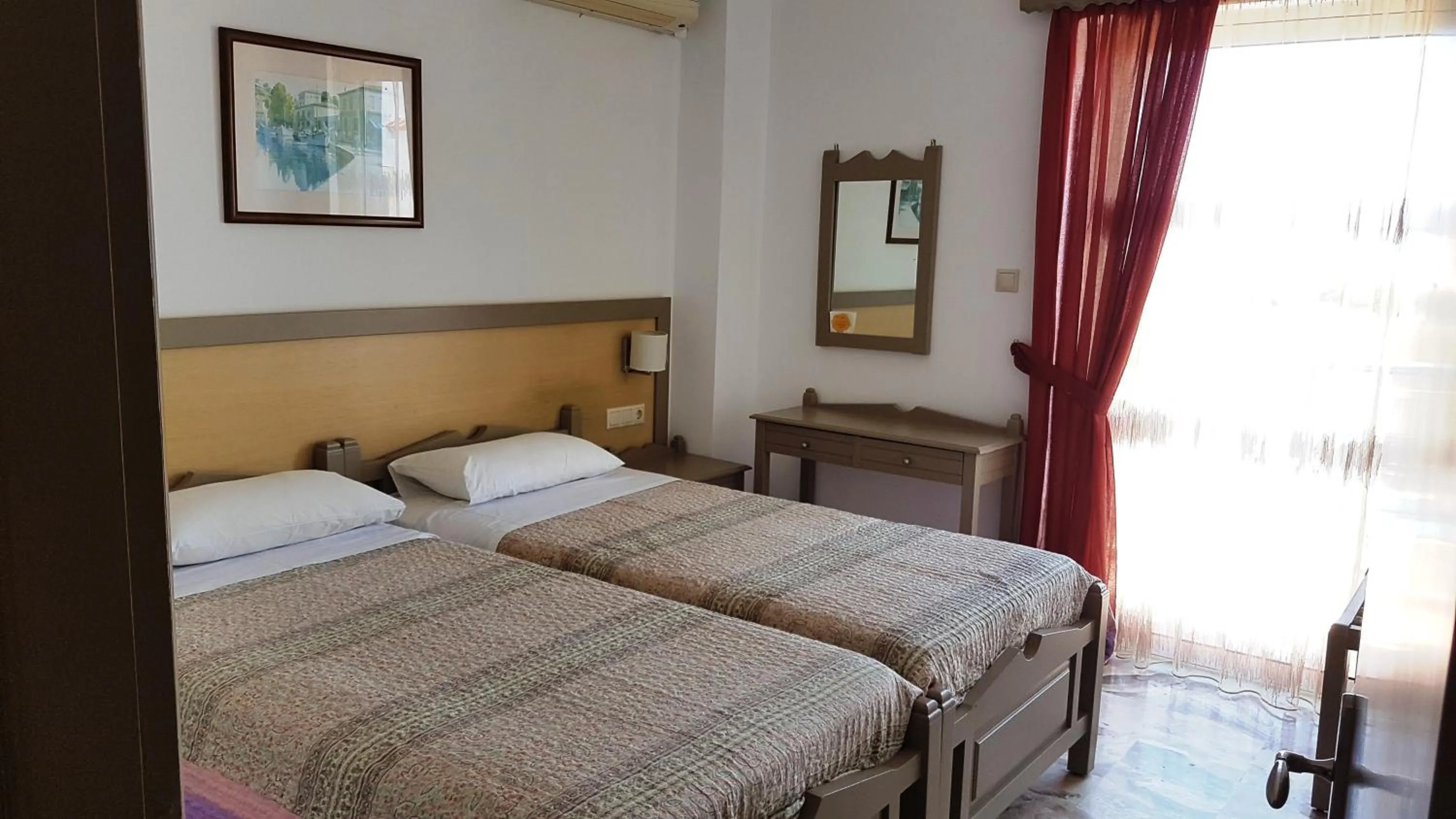 Bed in Luis Apartments