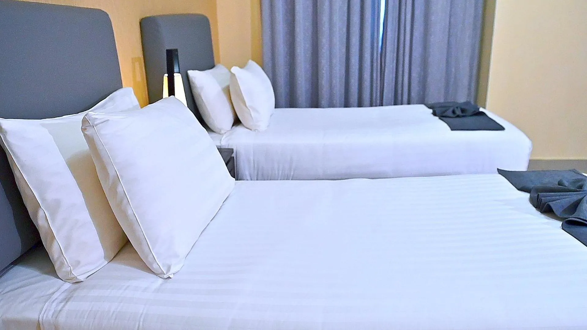 Bed in Ewan Tower Hotel Apartments