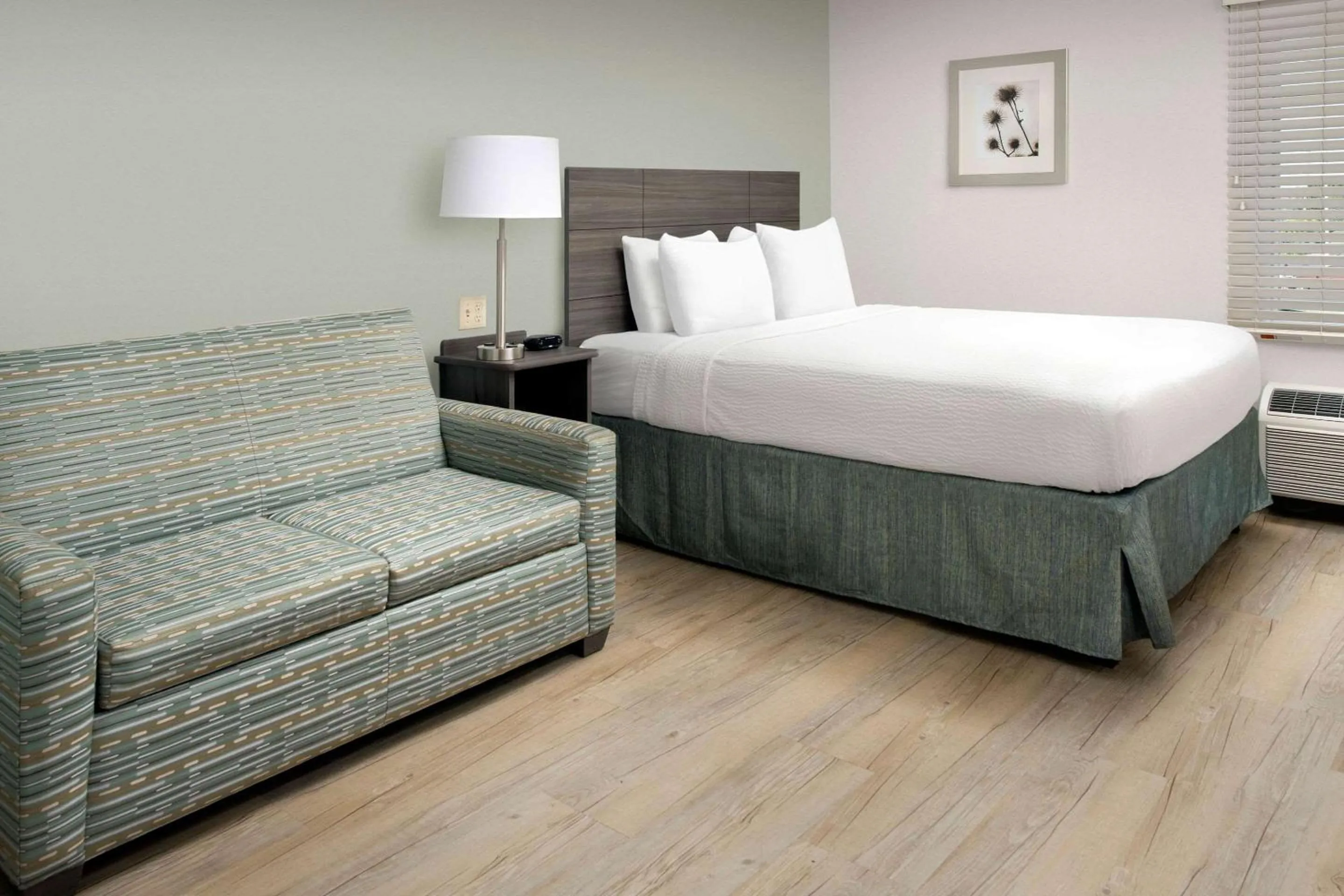 Bedroom, Bed in WoodSpring Suites Broken Arrow