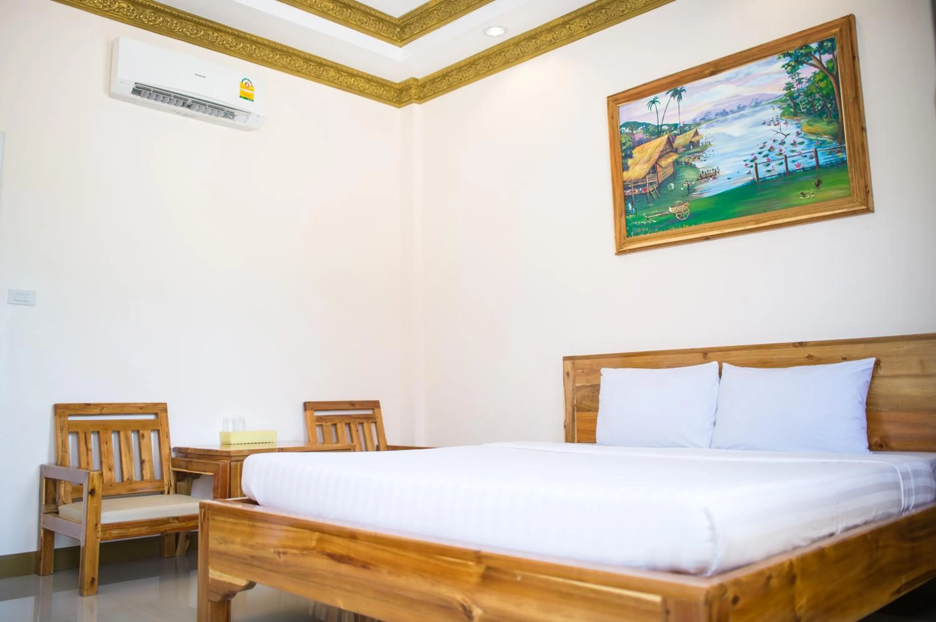 Bed in Pailin Resort