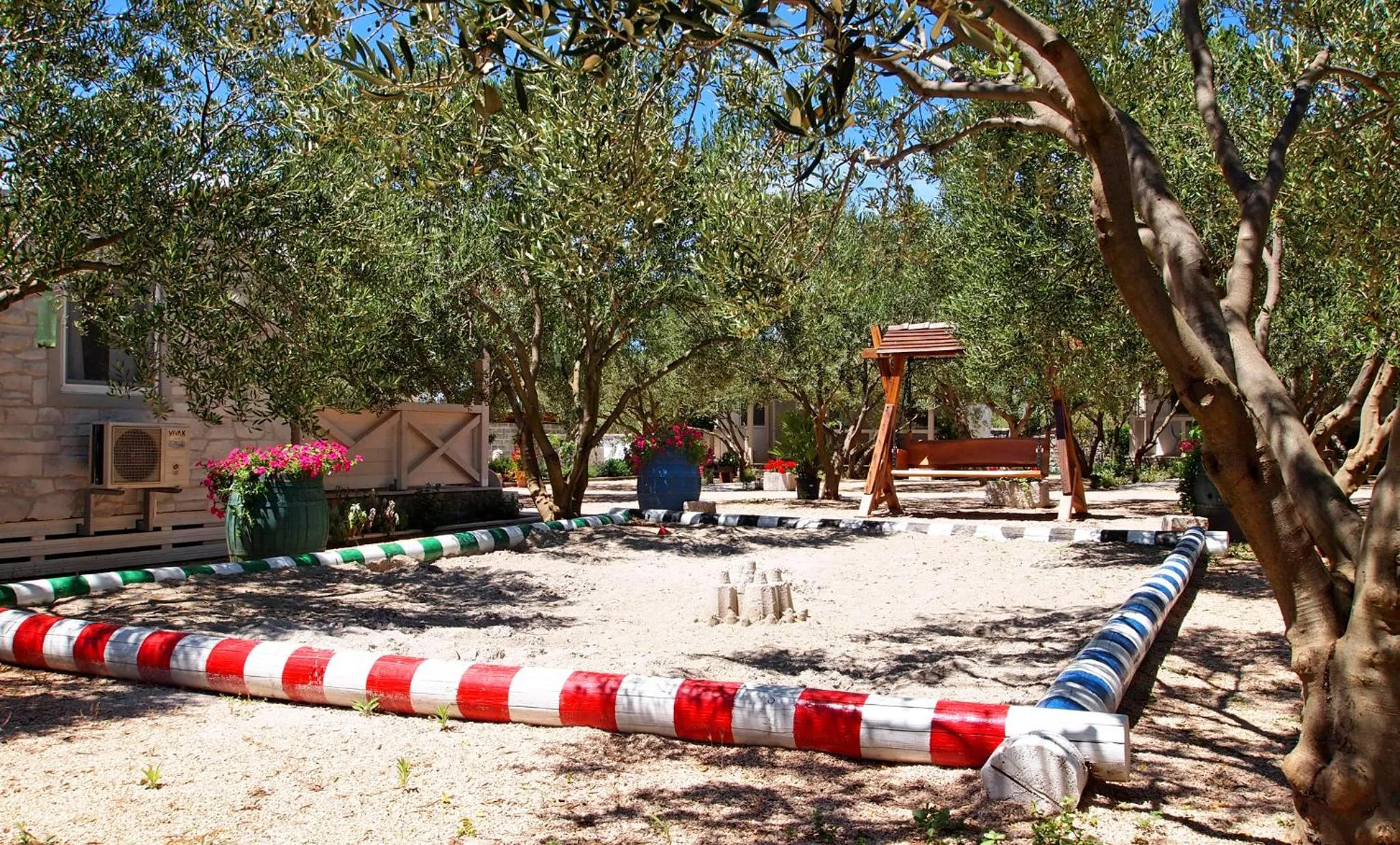 Children play ground in Mobile Homes Holiday Olive Garden