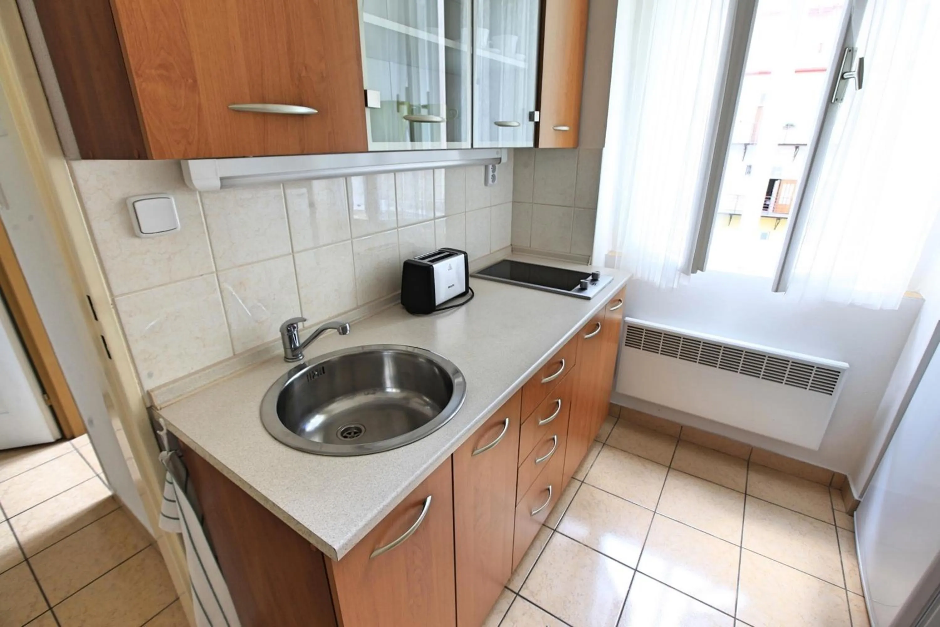 Kitchen or kitchenette in Angel City Aparthotel