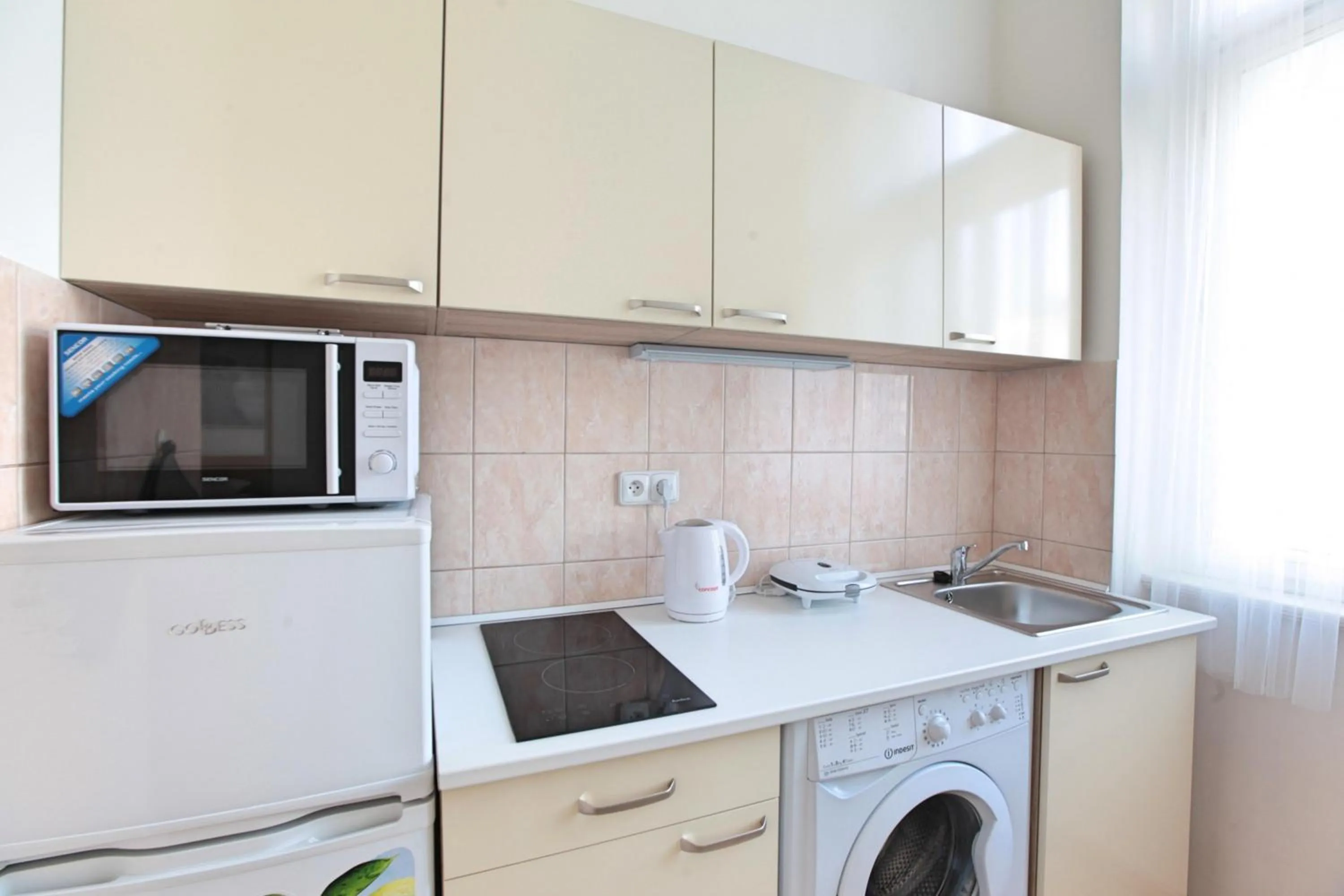 Kitchen or kitchenette in Angel City Aparthotel