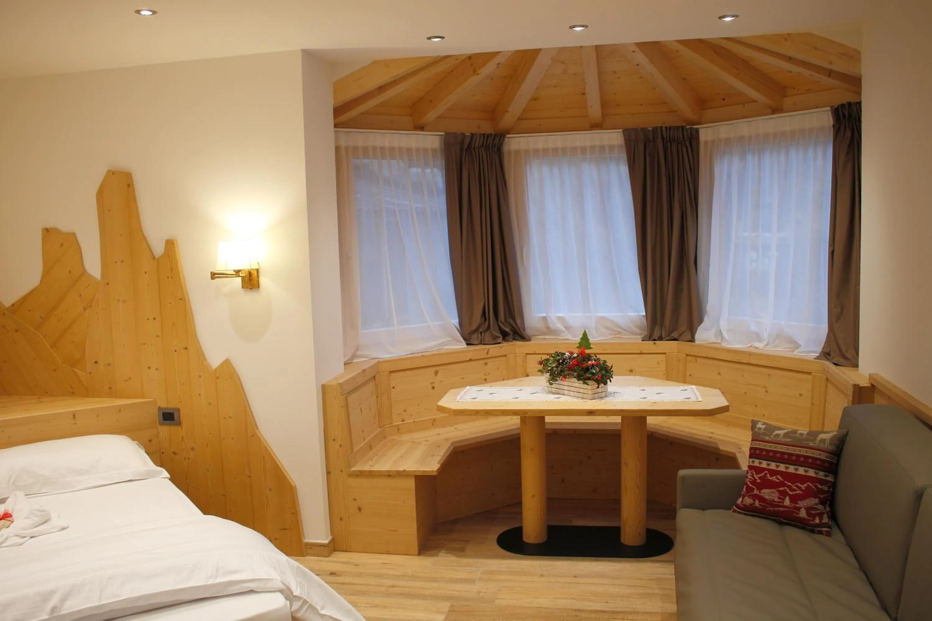 Seating area, Bed in B&B Augusto