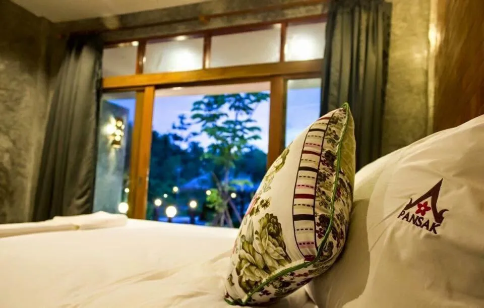 Bedroom in Ruean Thai Nai Bang by PANSAK Resort