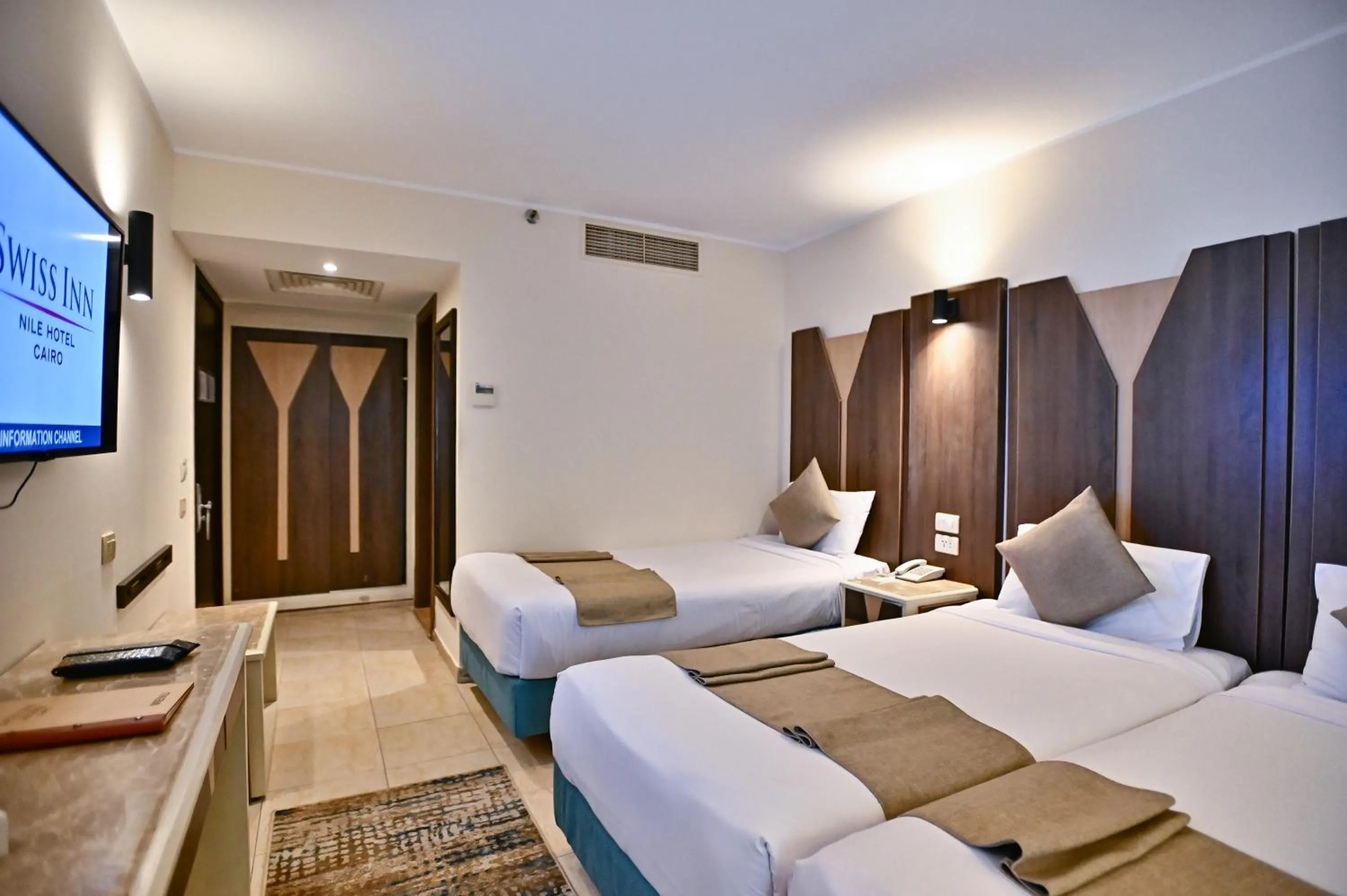 Bed in Swiss Inn Nile Hotel