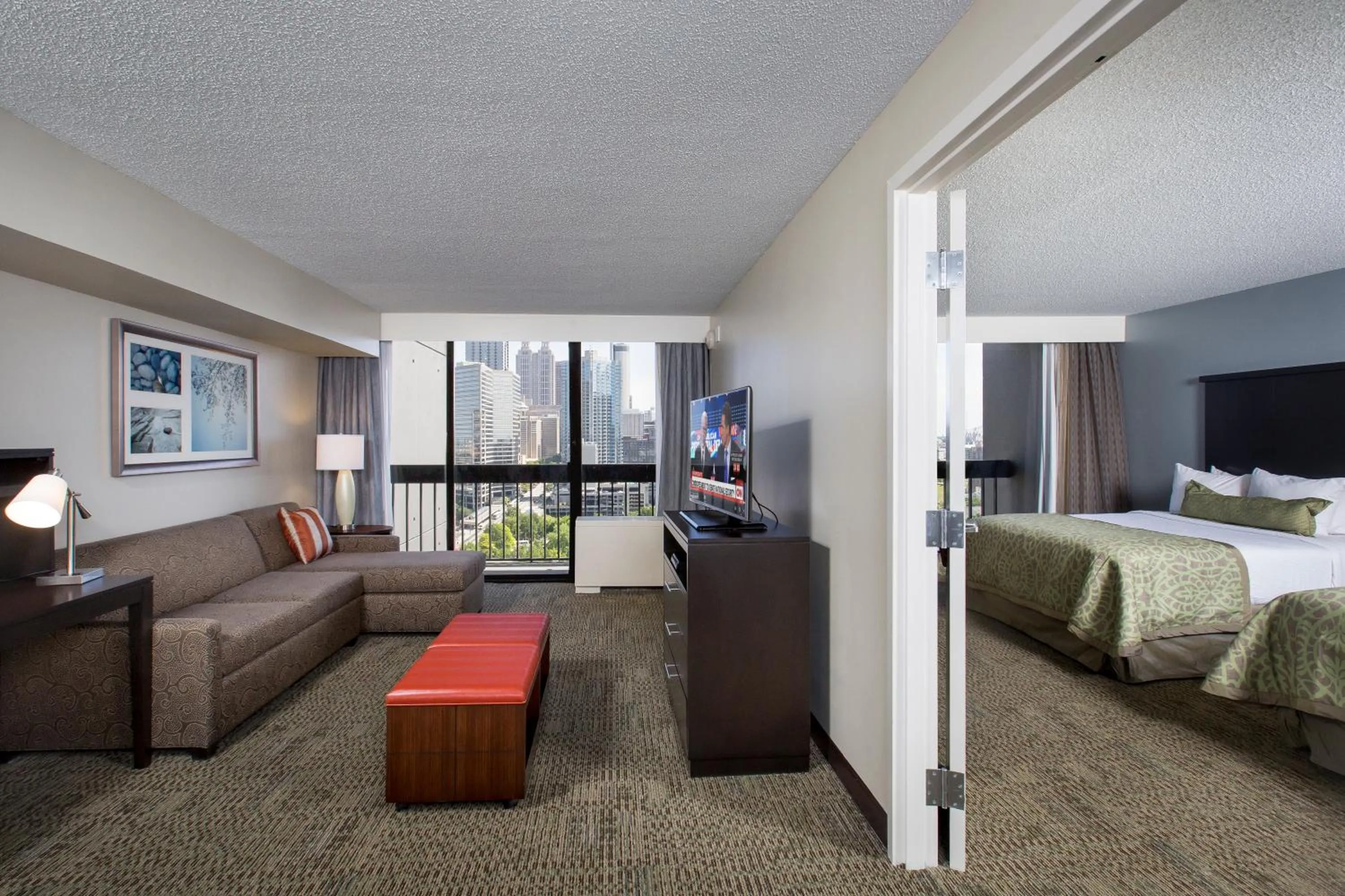 Living room, Bed in Staybridge Suites Atlanta - Midtown by IHG