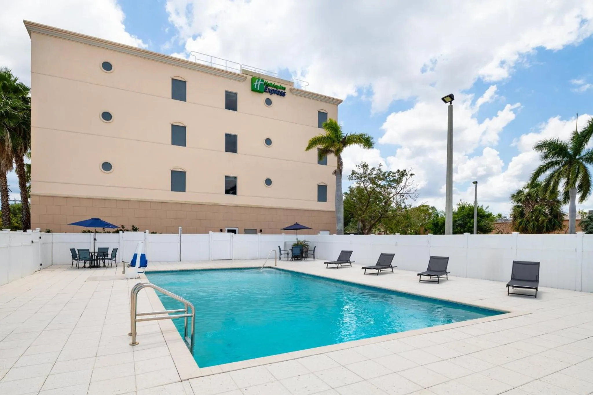 Swimming pool in Holiday Inn Express & Suites Boynton Beach by IHG