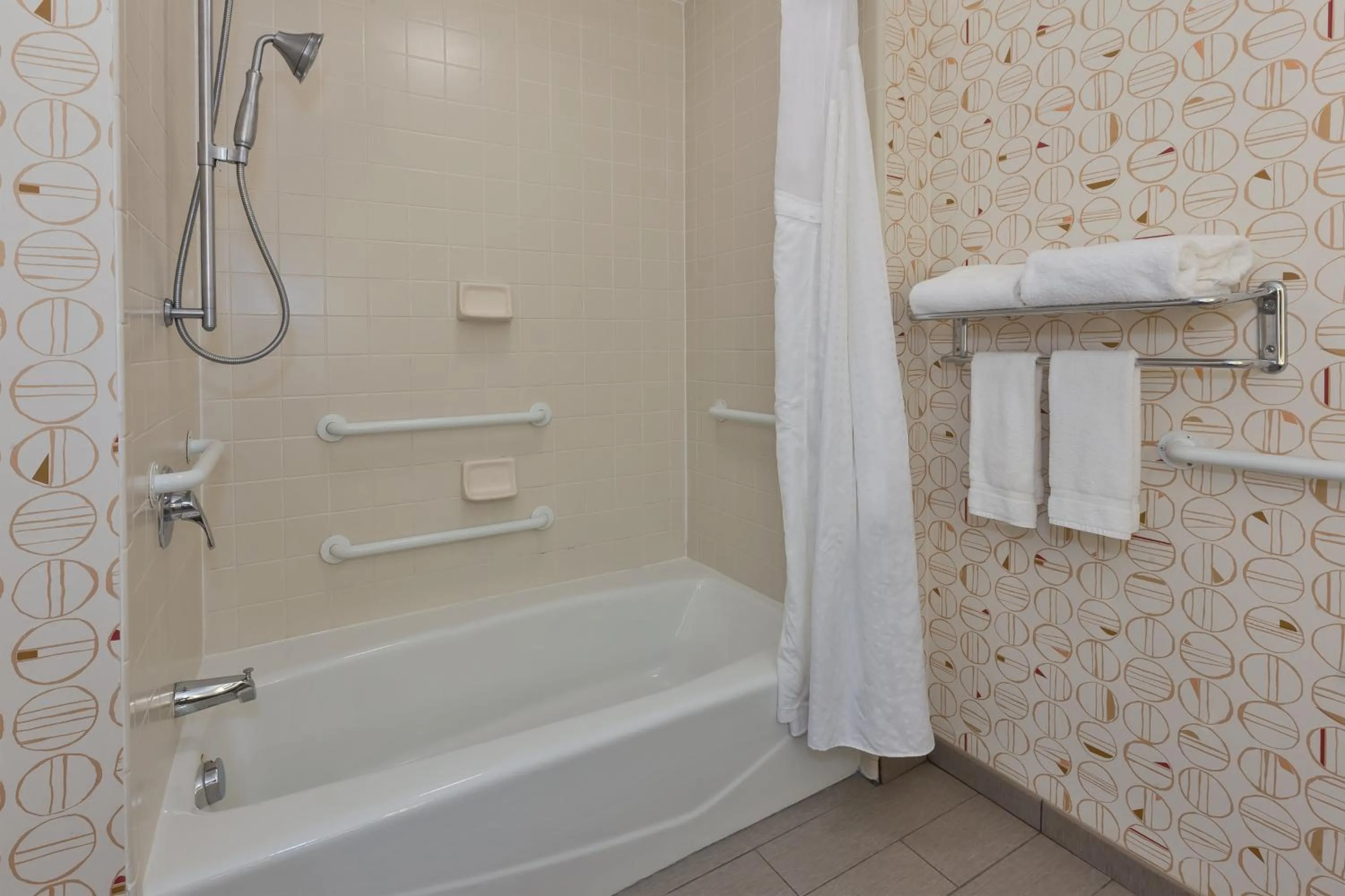 Bathroom in Holiday Inn Grand Rapids - South by IHG