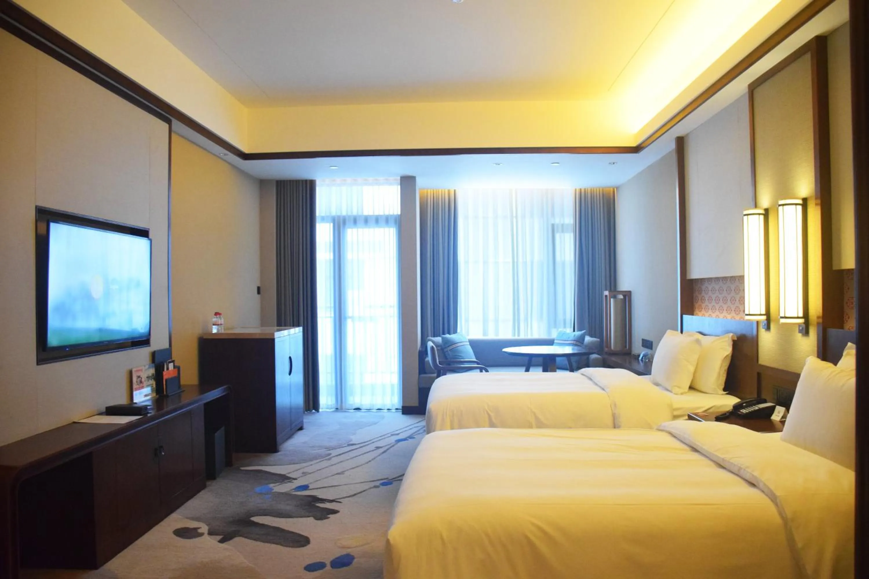 Photo of the whole room, Bed in Howard Johnson Neodalle Resort Zhangjiajie