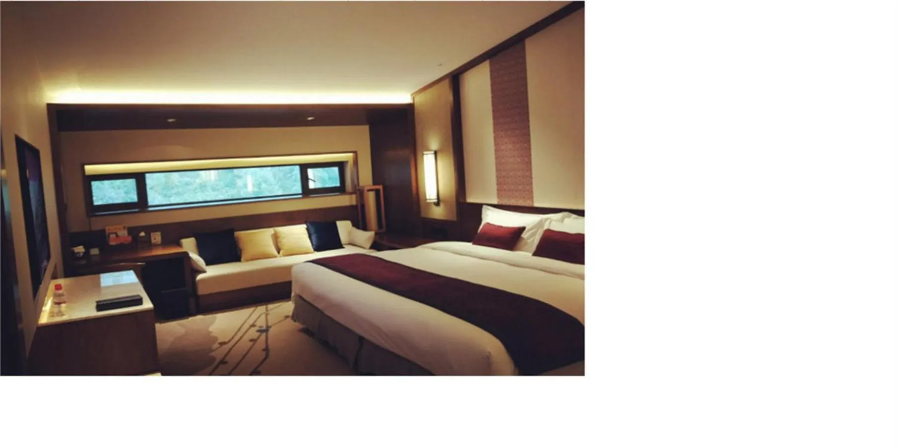 Photo of the whole room, Bed in Howard Johnson Neodalle Resort Zhangjiajie