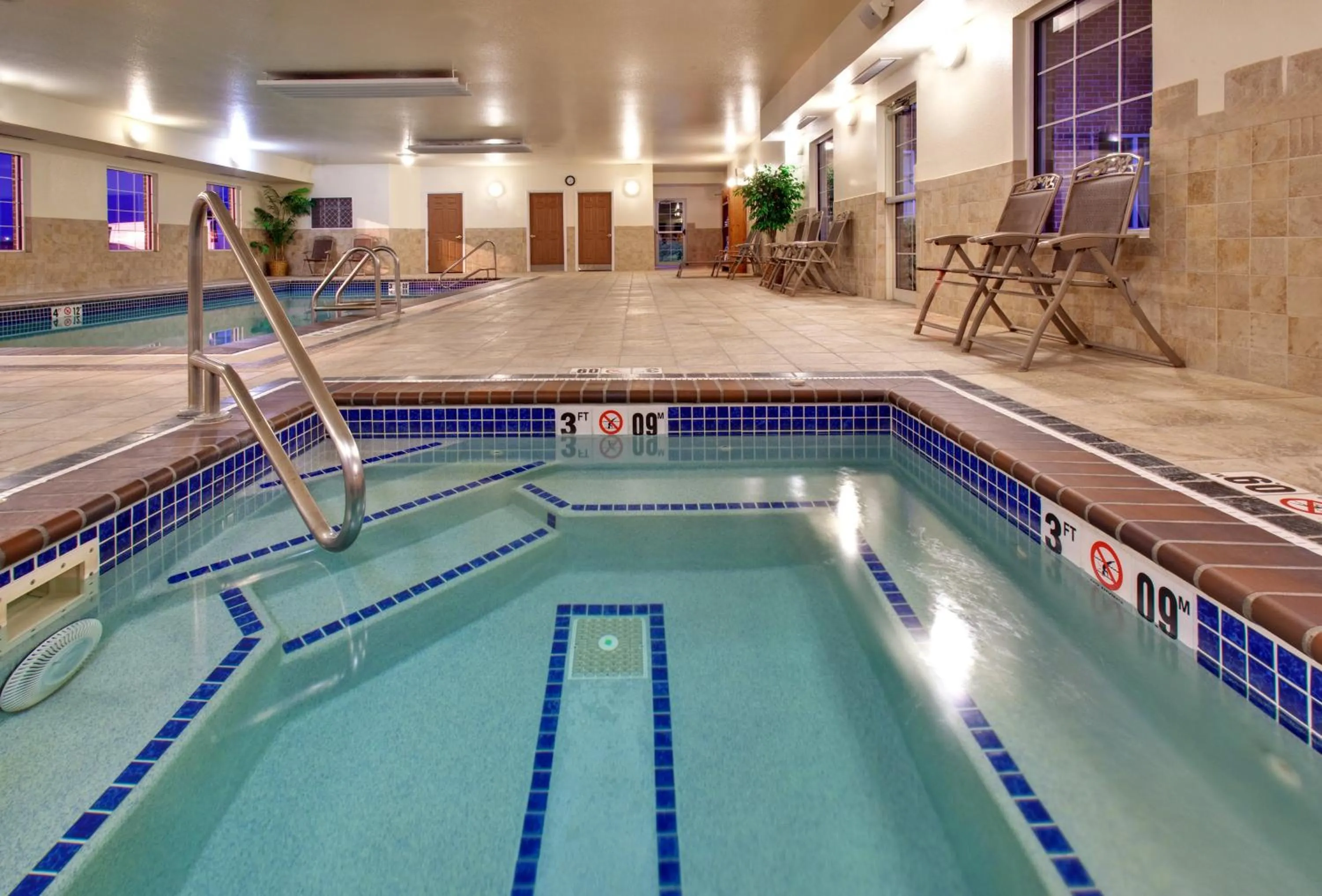 Swimming pool in Staybridge Suites Sioux Falls at Empire Mall by IHG