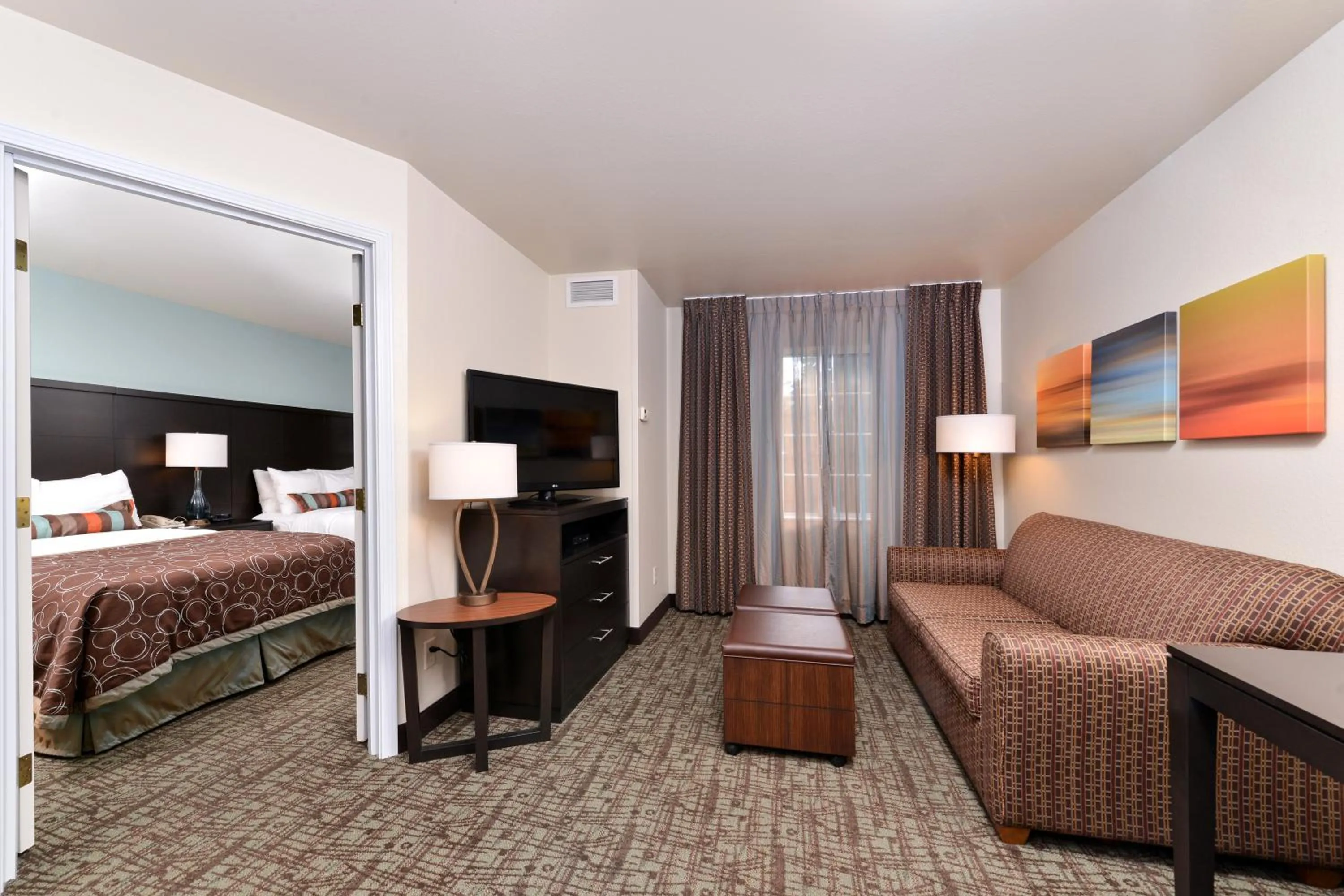 Photo of the whole room, Bed in Staybridge Suites Sioux Falls at Empire Mall by IHG