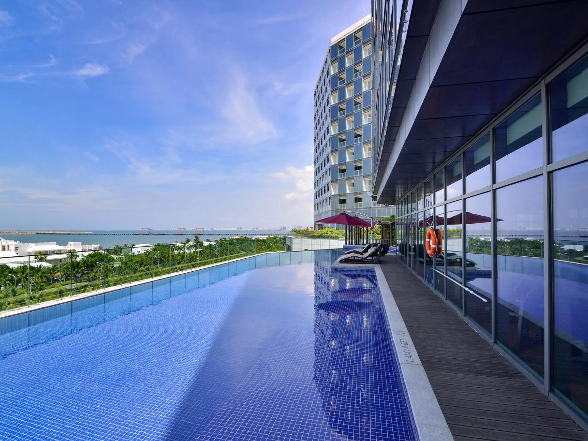 Pool view in Holiday Inn Haikou West Coast by IHG