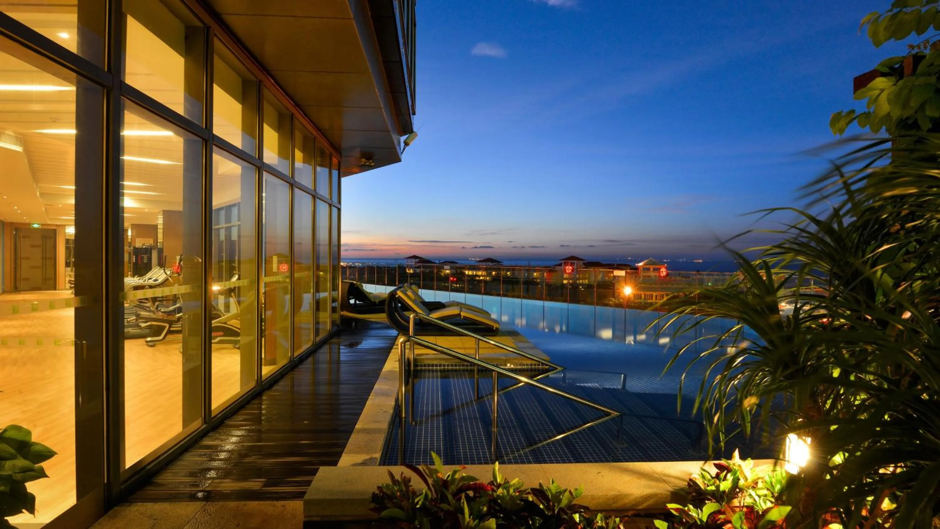 Swimming pool in Holiday Inn Haikou West Coast by IHG