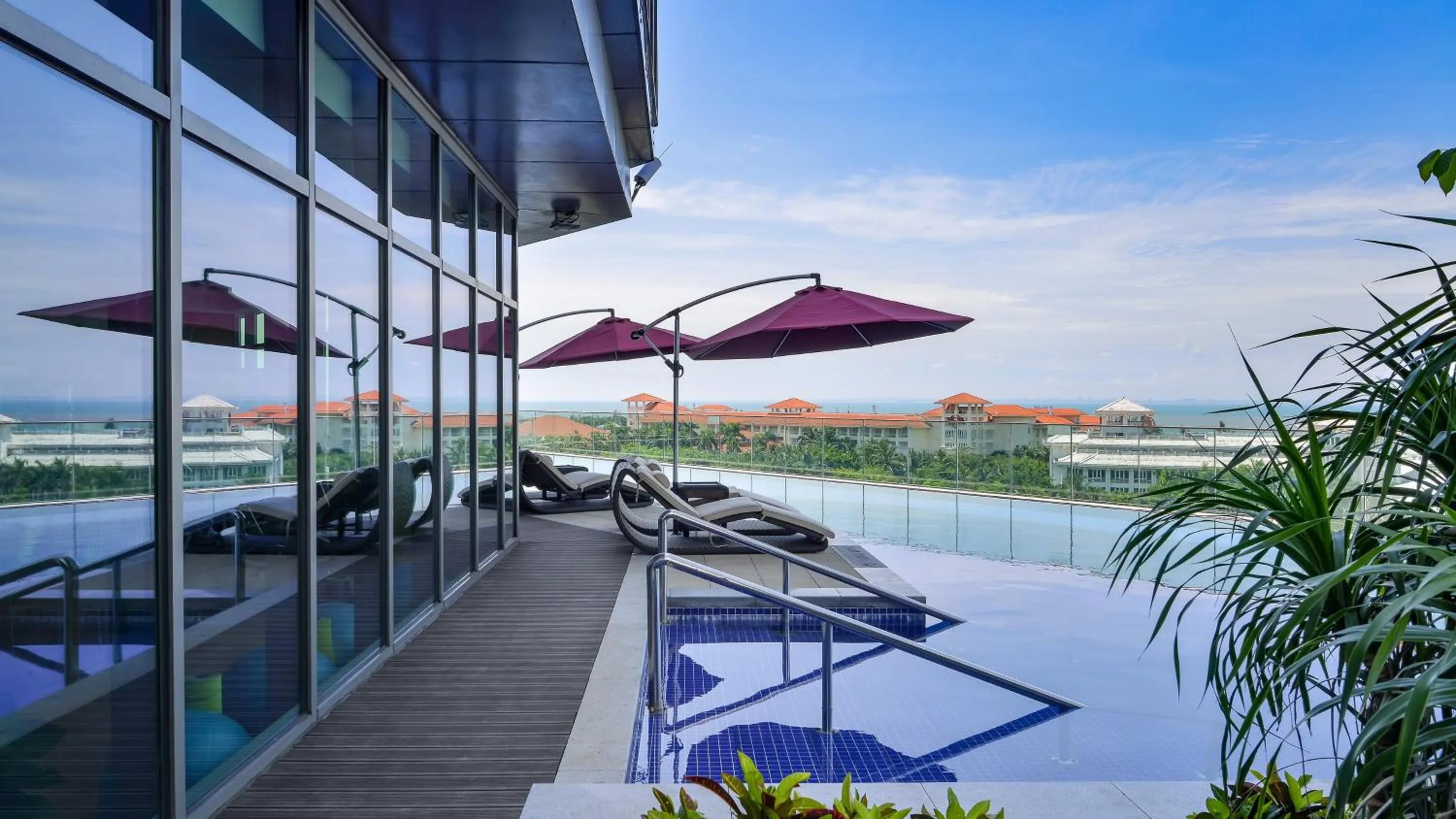 Swimming pool in Holiday Inn Haikou West Coast by IHG