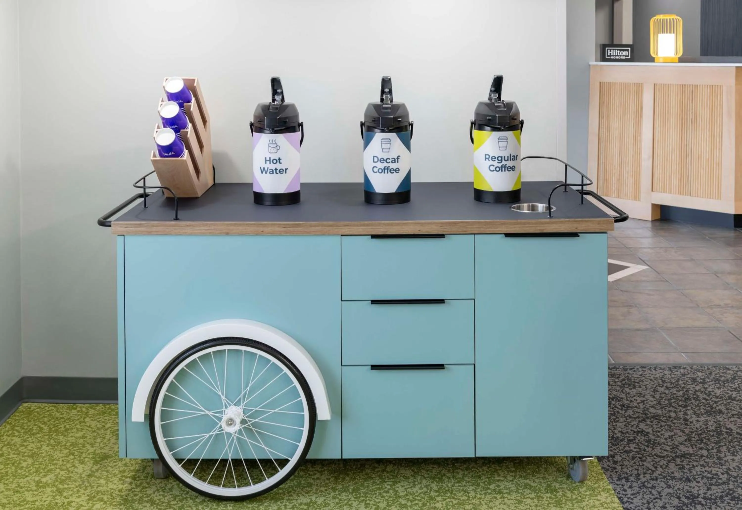 Dining area in Spark By Hilton Lansing