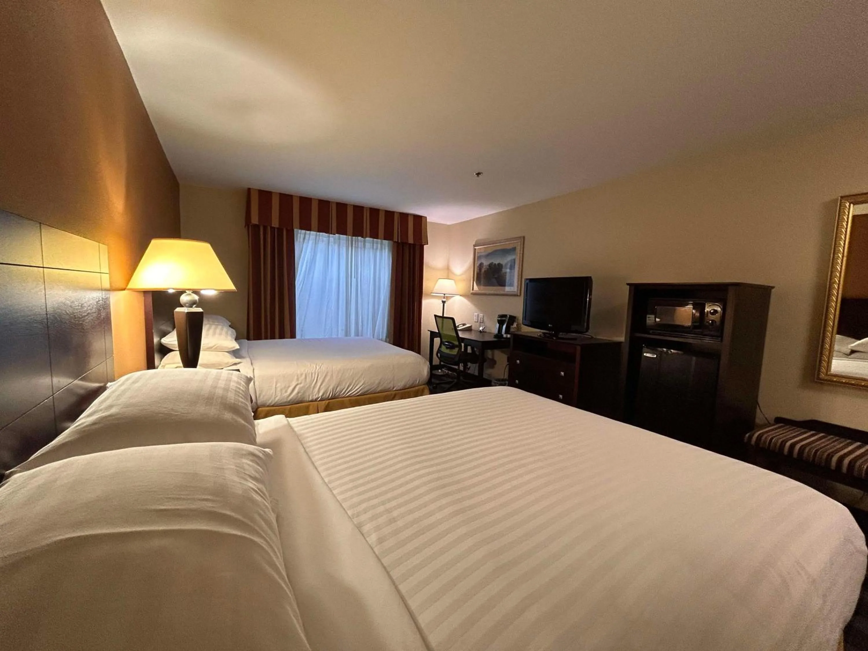Bedroom, Bed in Express Inn Leesville Ft Johnson, SureStay Collection by Best Western