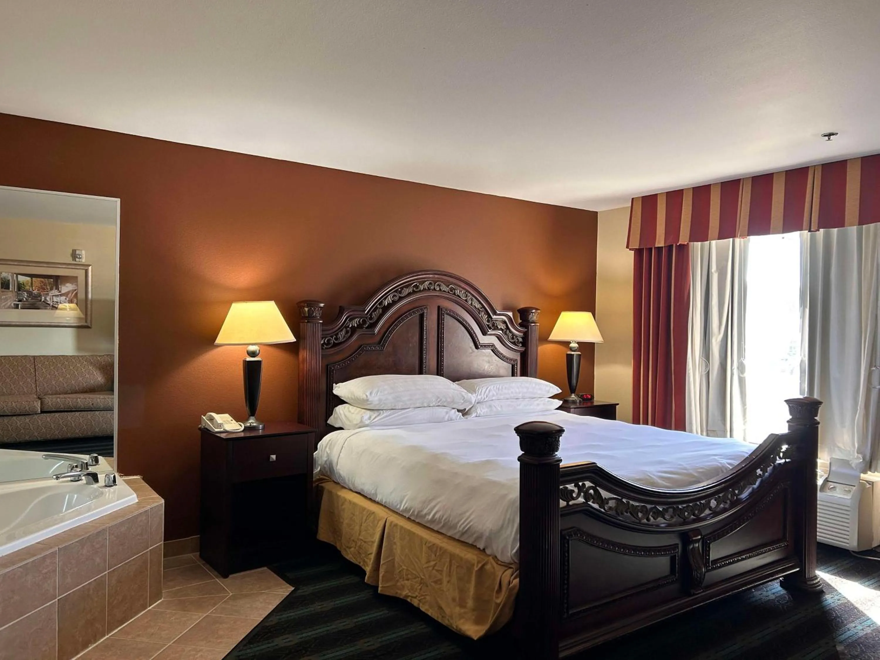 Bedroom, Bed in Express Inn Leesville Ft Johnson, SureStay Collection by Best Western