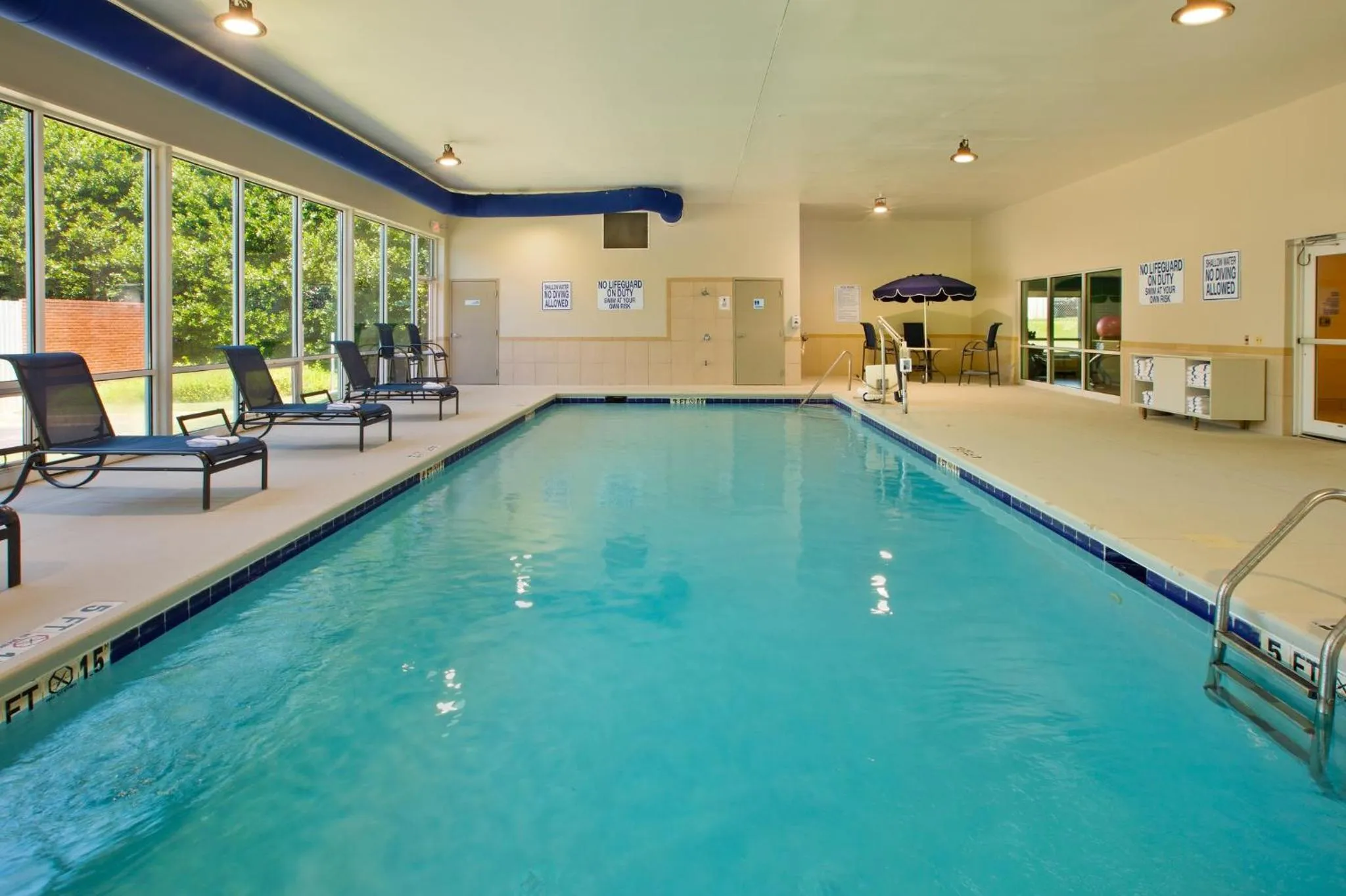 Swimming pool in Holiday Inn Express & Suites I-26 & Us 29 At Westgate Mall by IHG