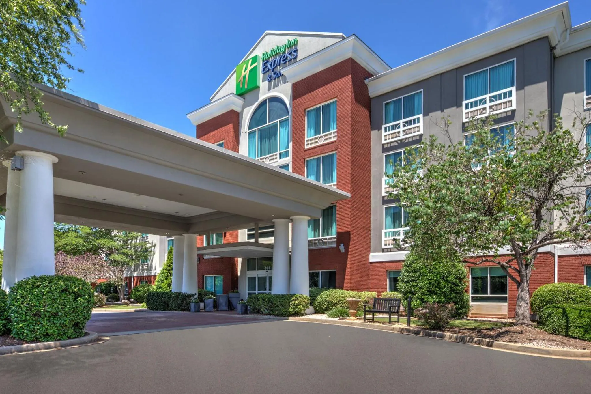 Property building in Holiday Inn Express & Suites I-26 & Us 29 At Westgate Mall by IHG