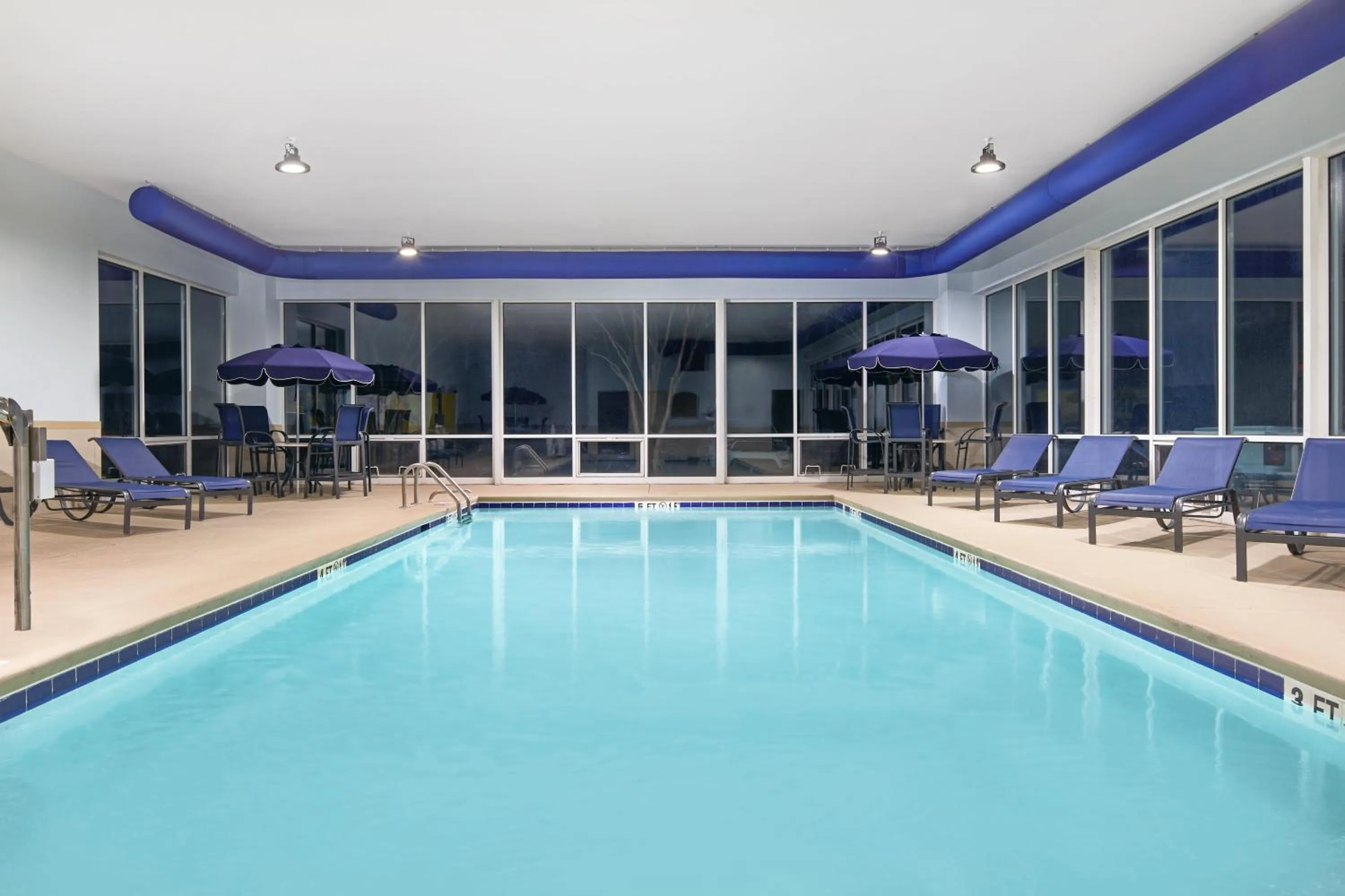 Swimming pool in Holiday Inn Express & Suites I-26 & Us 29 At Westgate Mall by IHG