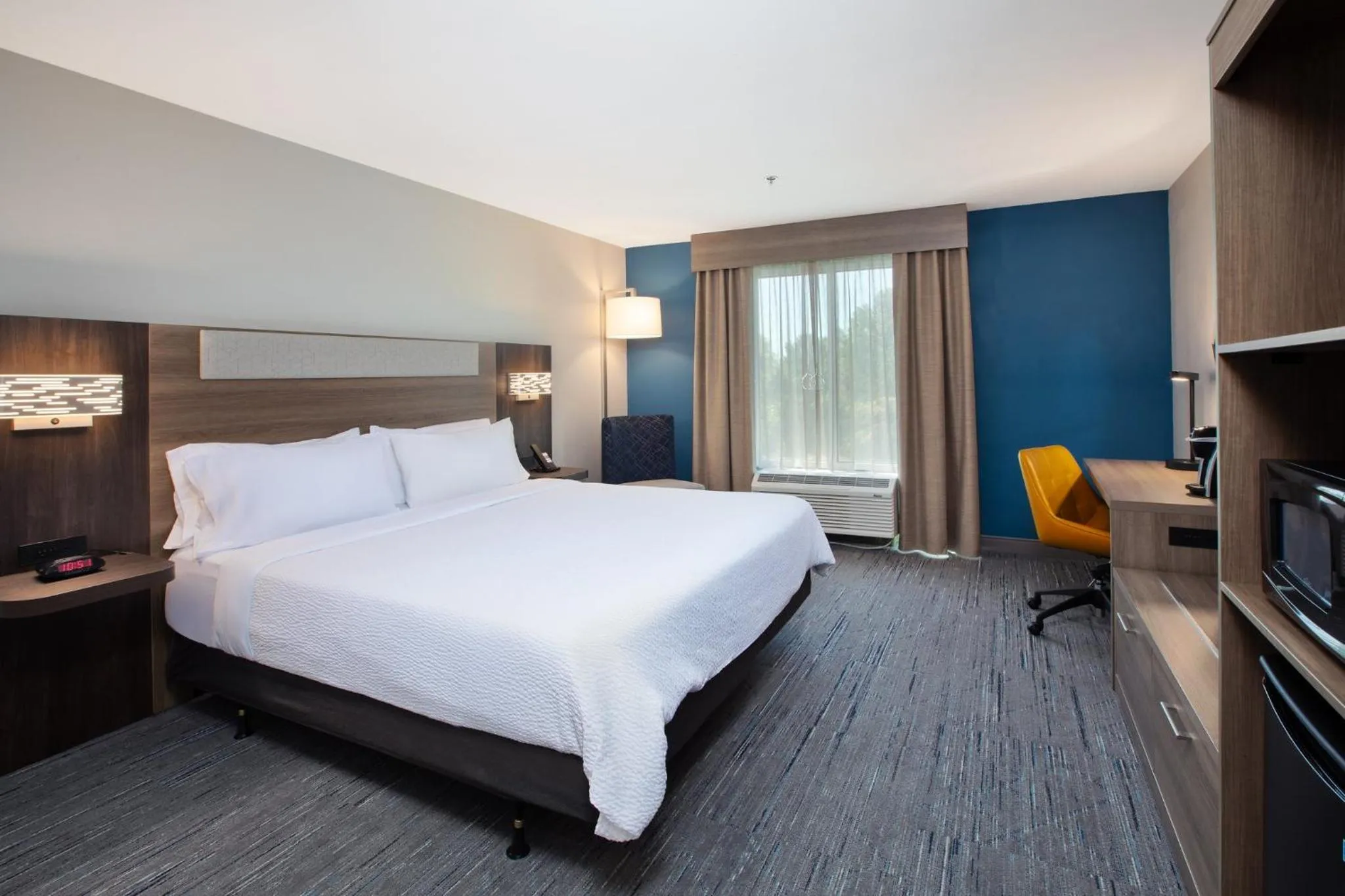 Photo of the whole room, Bed in Holiday Inn Express & Suites I-26 & Us 29 At Westgate Mall by IHG