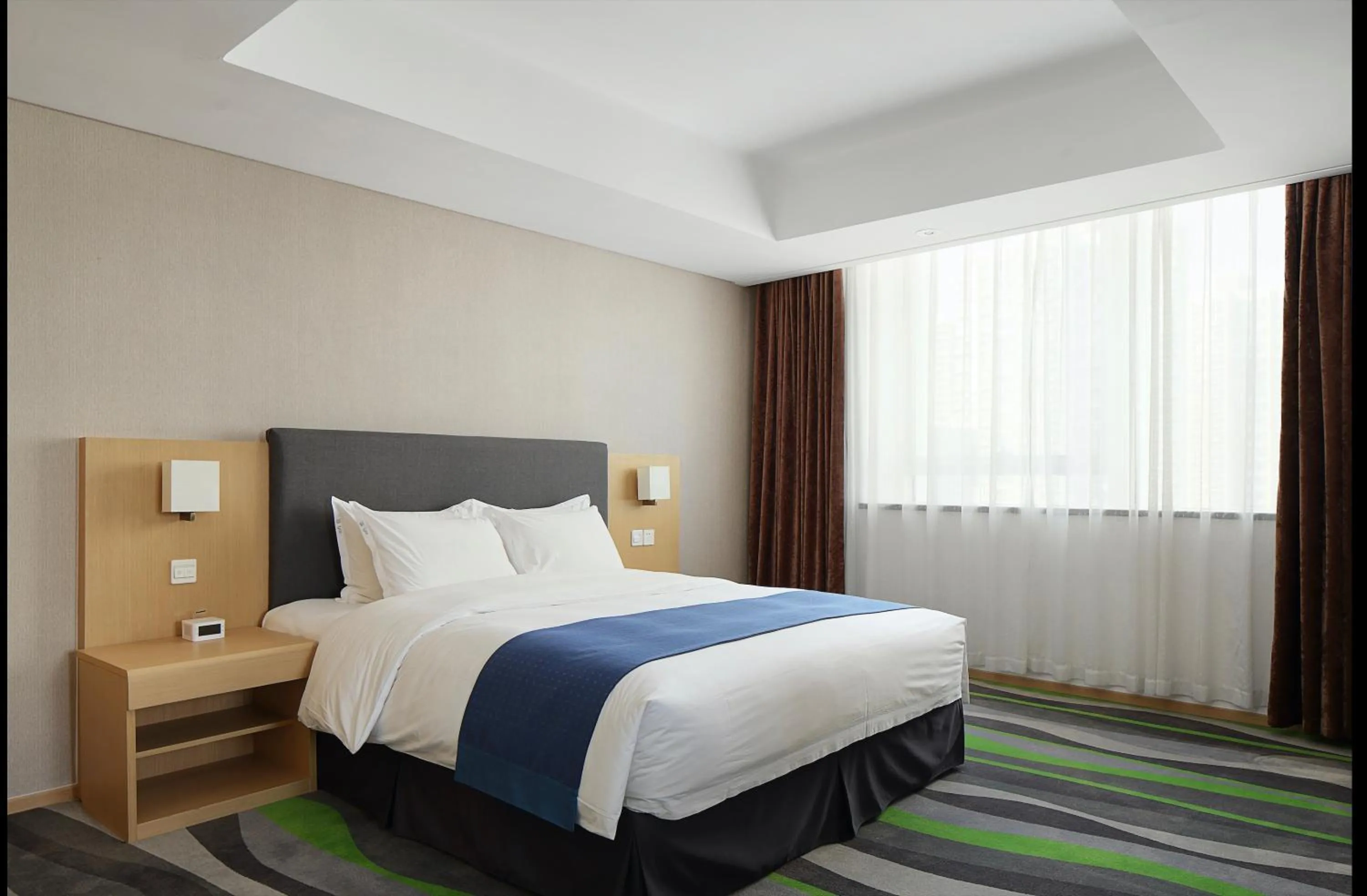Bed in Holiday Inn Express Jinan High-Tech Zone by IHG
