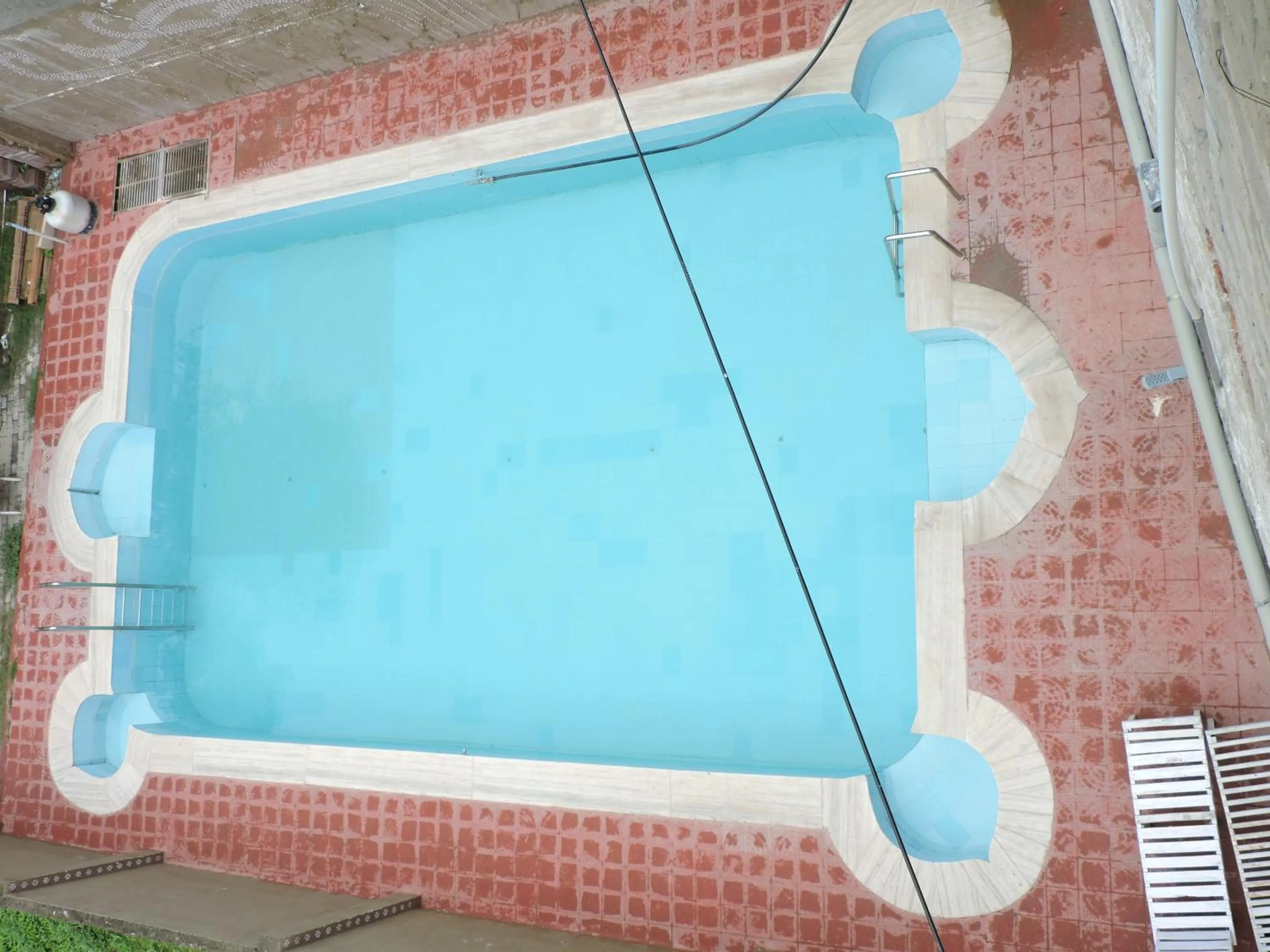 Swimming pool in Radhika Palace Hotel