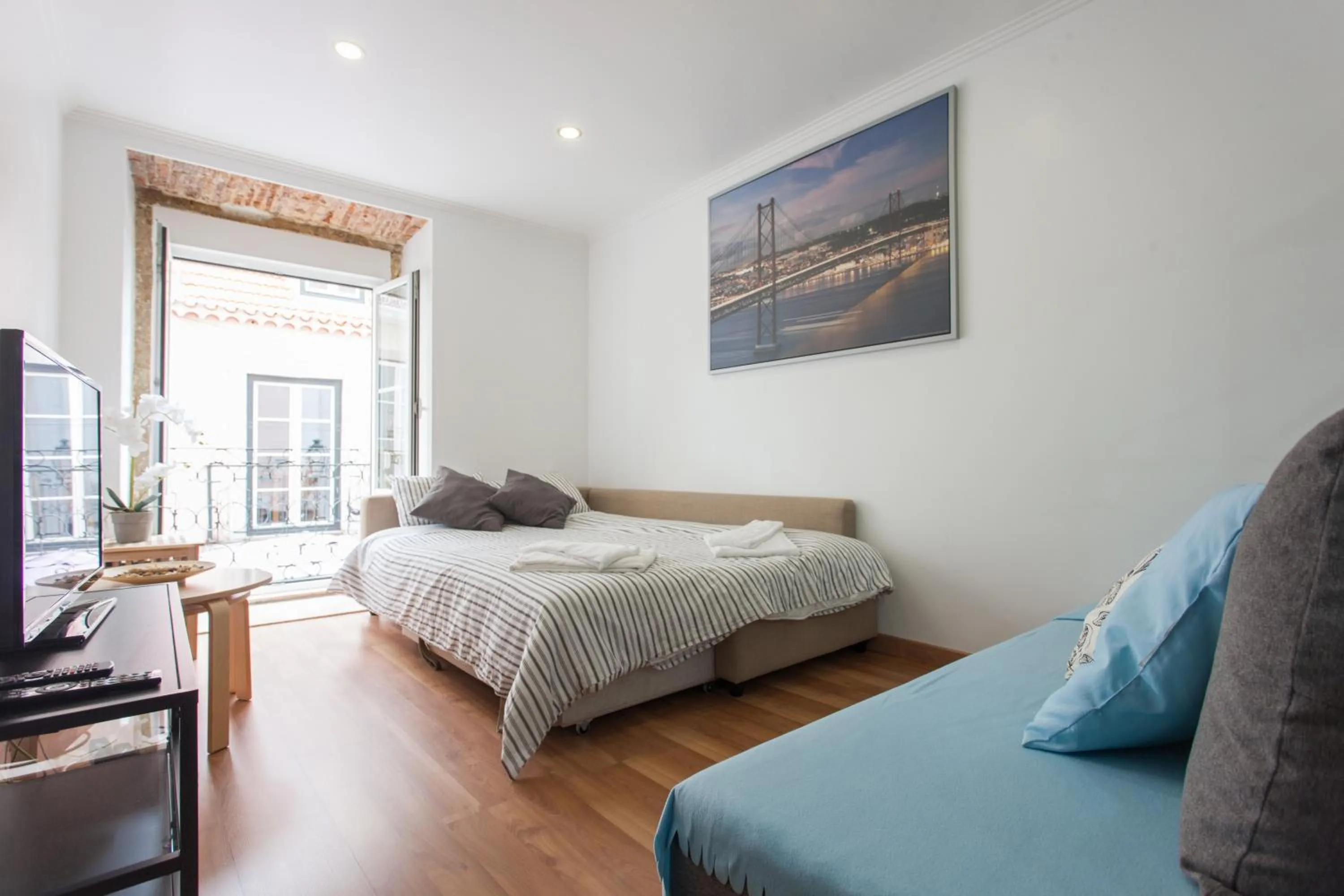 Living room, Bed in Apartments Center Bairro Alto