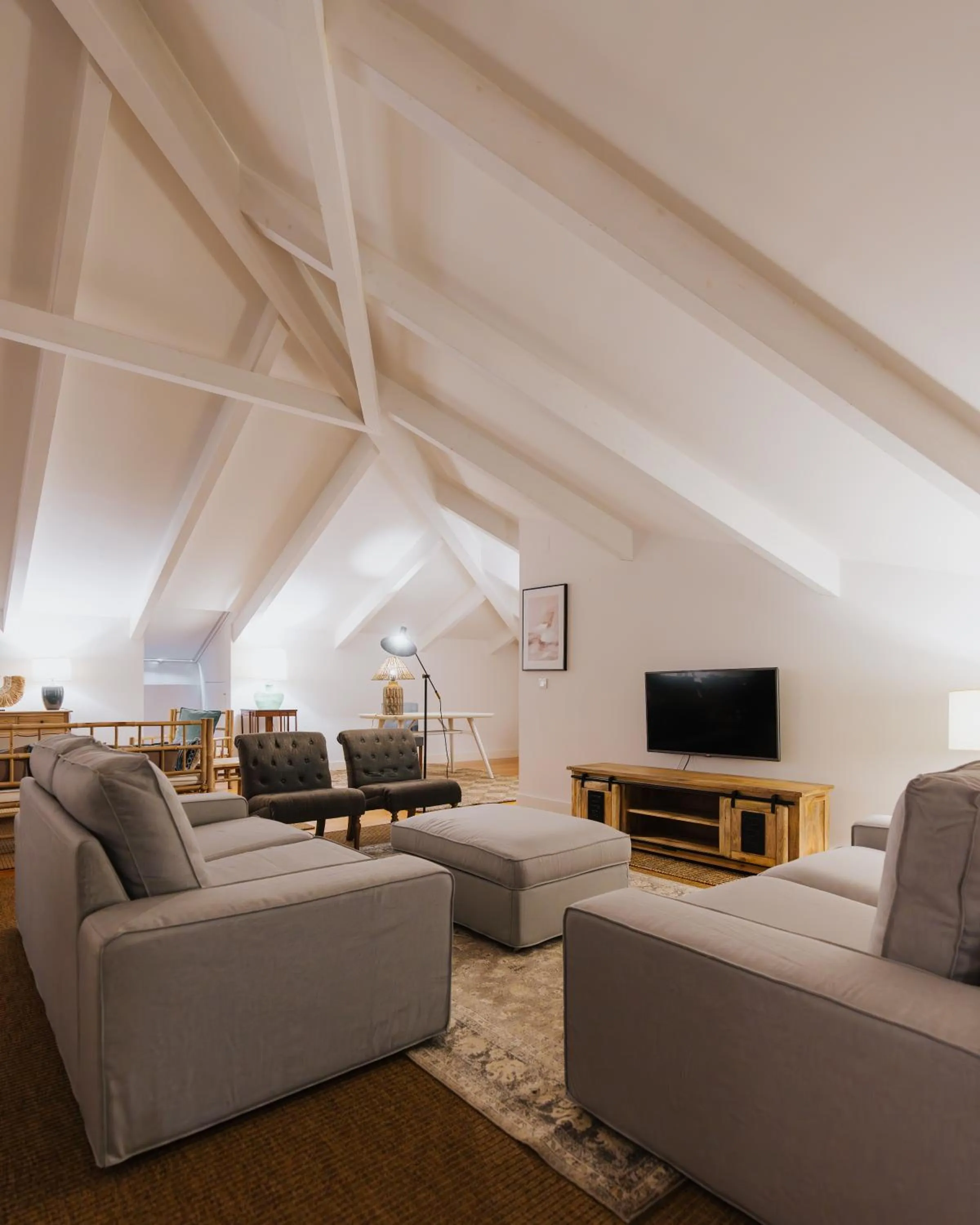 Communal lounge/ TV room in AlmaLusa Baixa/Chiado