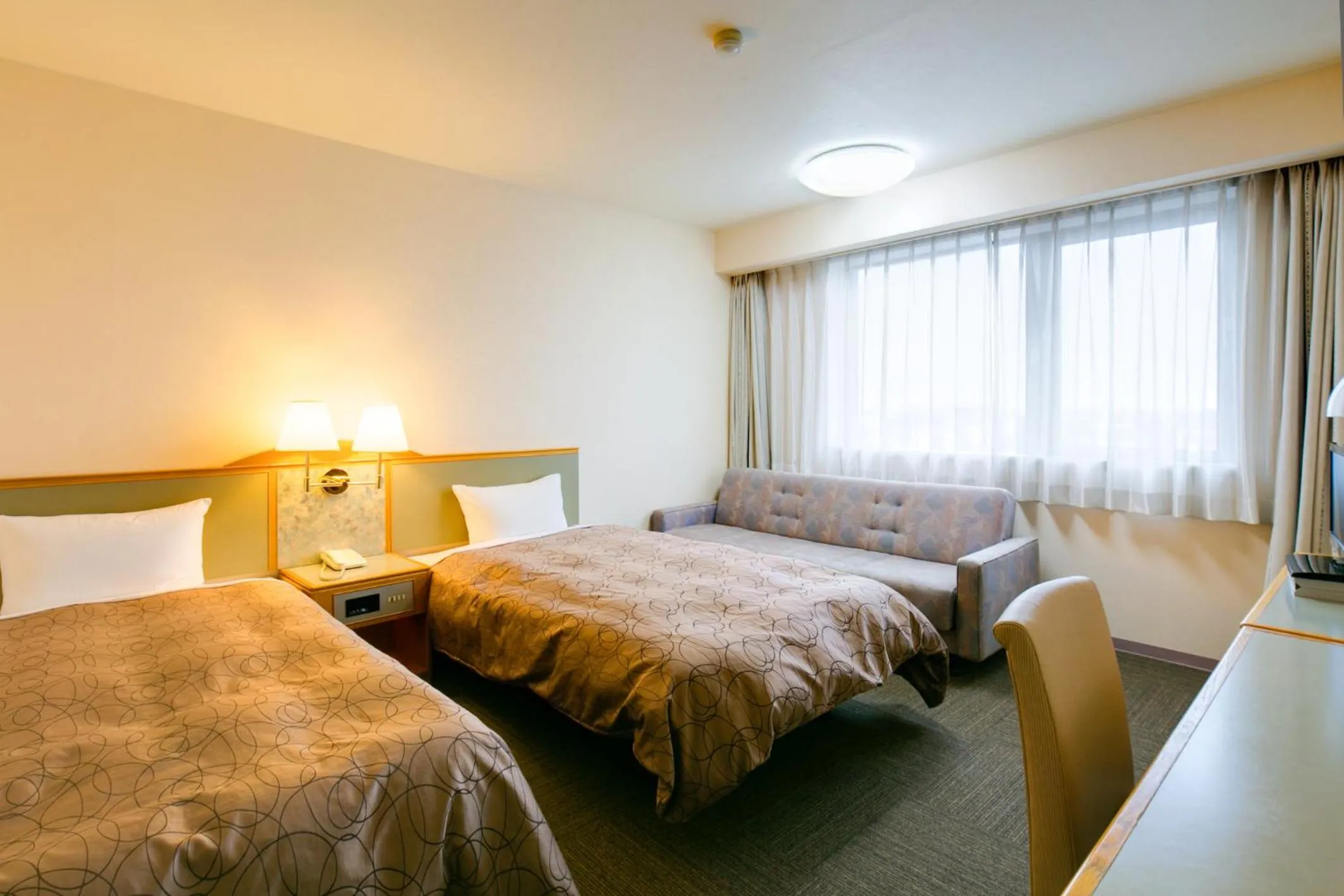 Photo of the whole room, Bed in Hotel Sunroute Tochigi