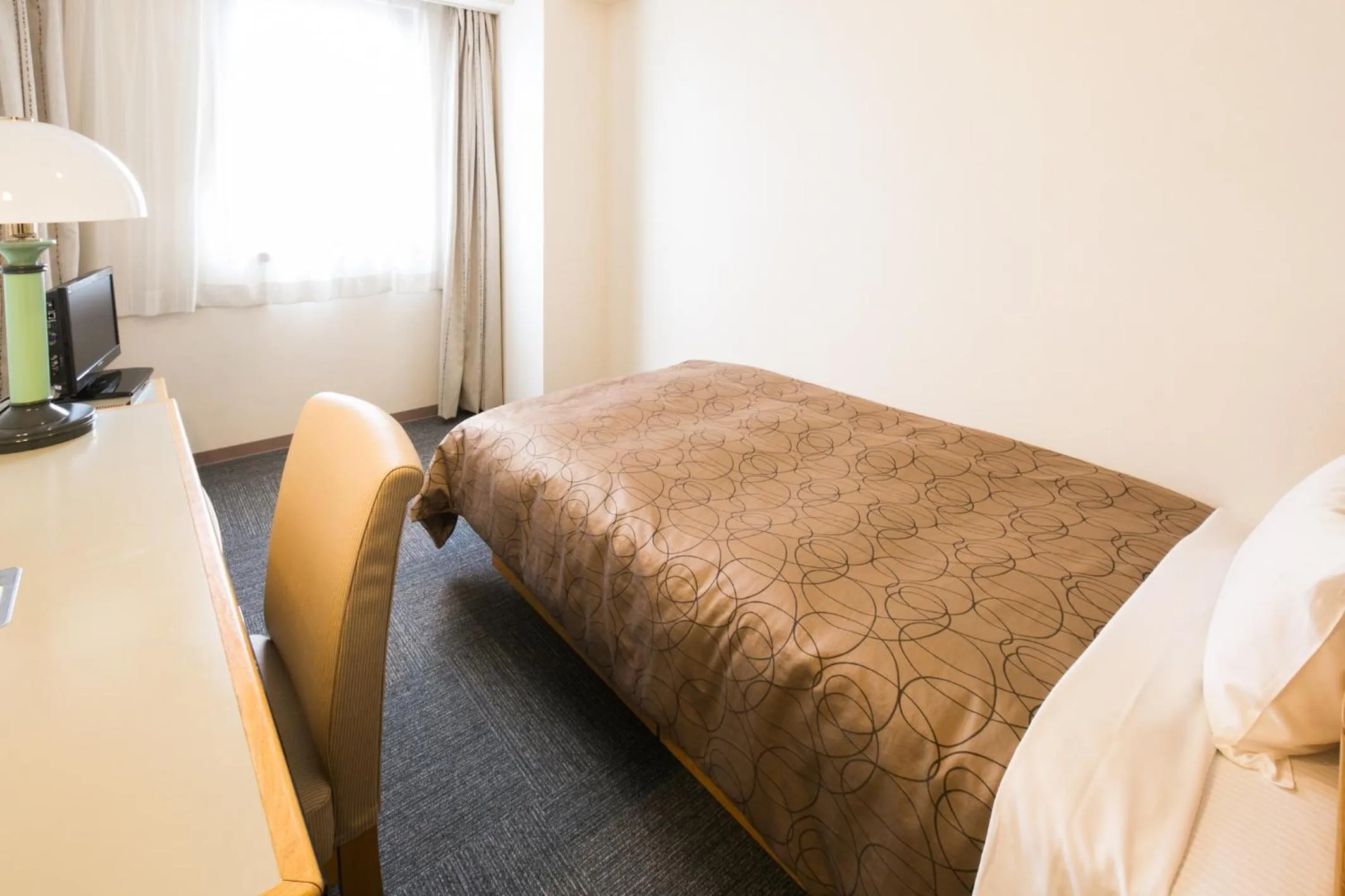 Photo of the whole room, Bed in Hotel Sunroute Tochigi