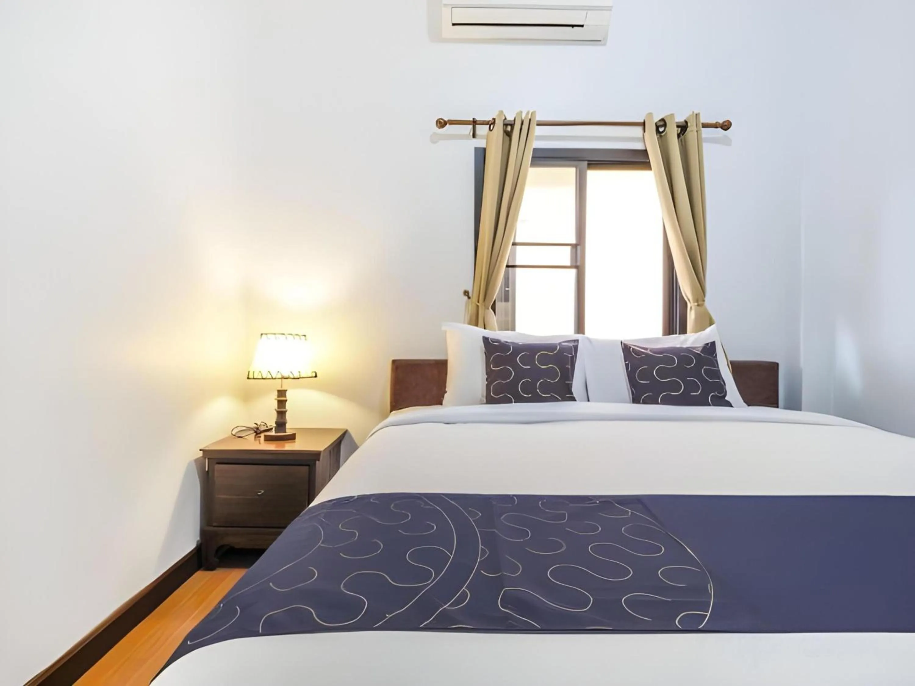 Photo of the whole room in Capital O 727 Be One Resort