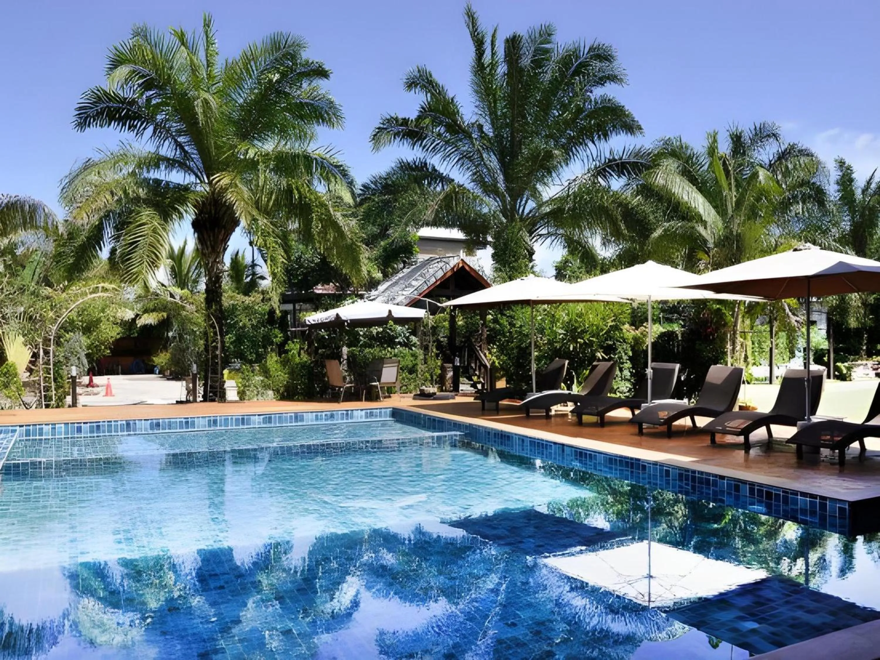 Swimming pool in Capital O 727 Be One Resort