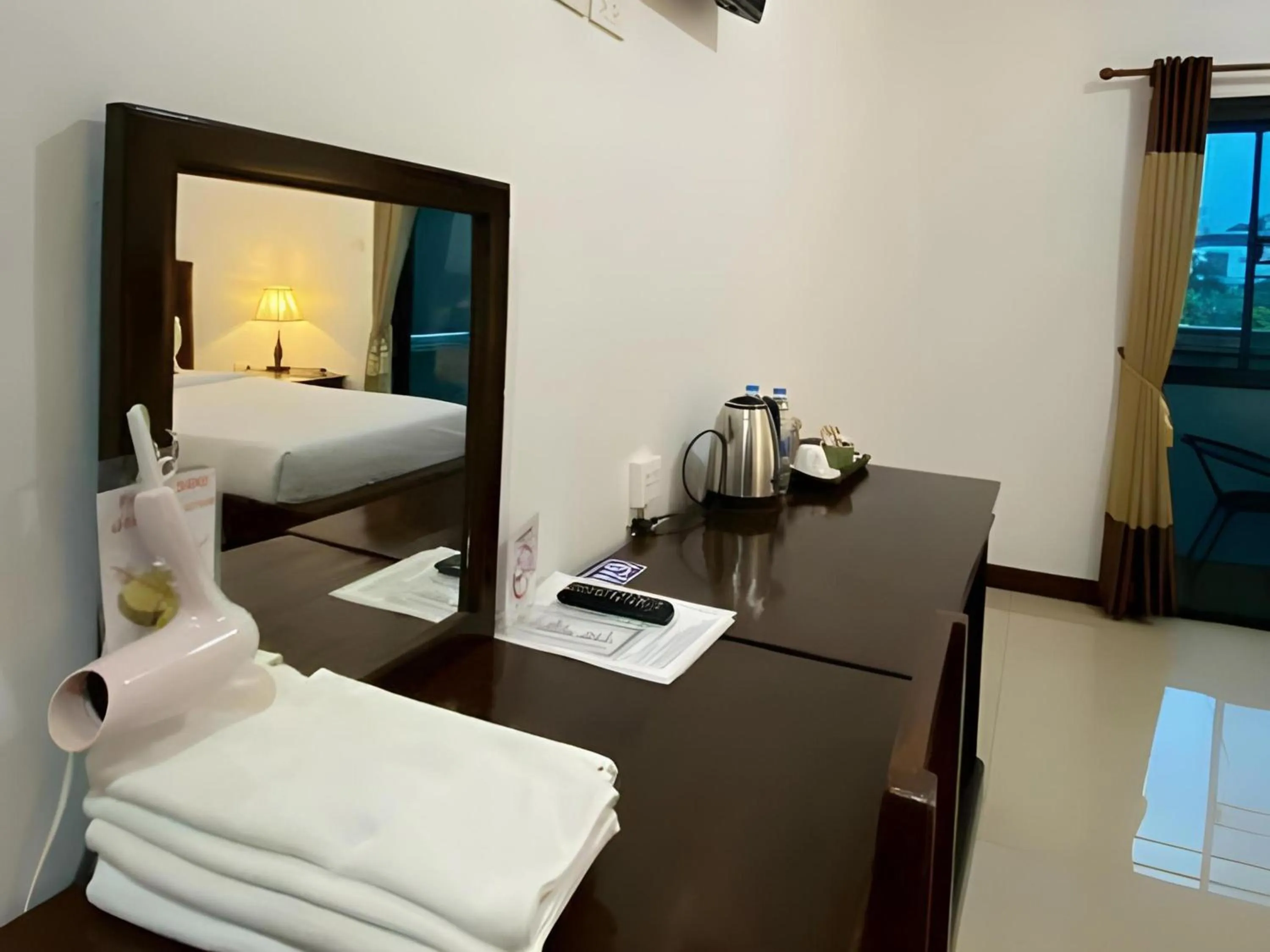 Photo of the whole room in Capital O 727 Be One Resort