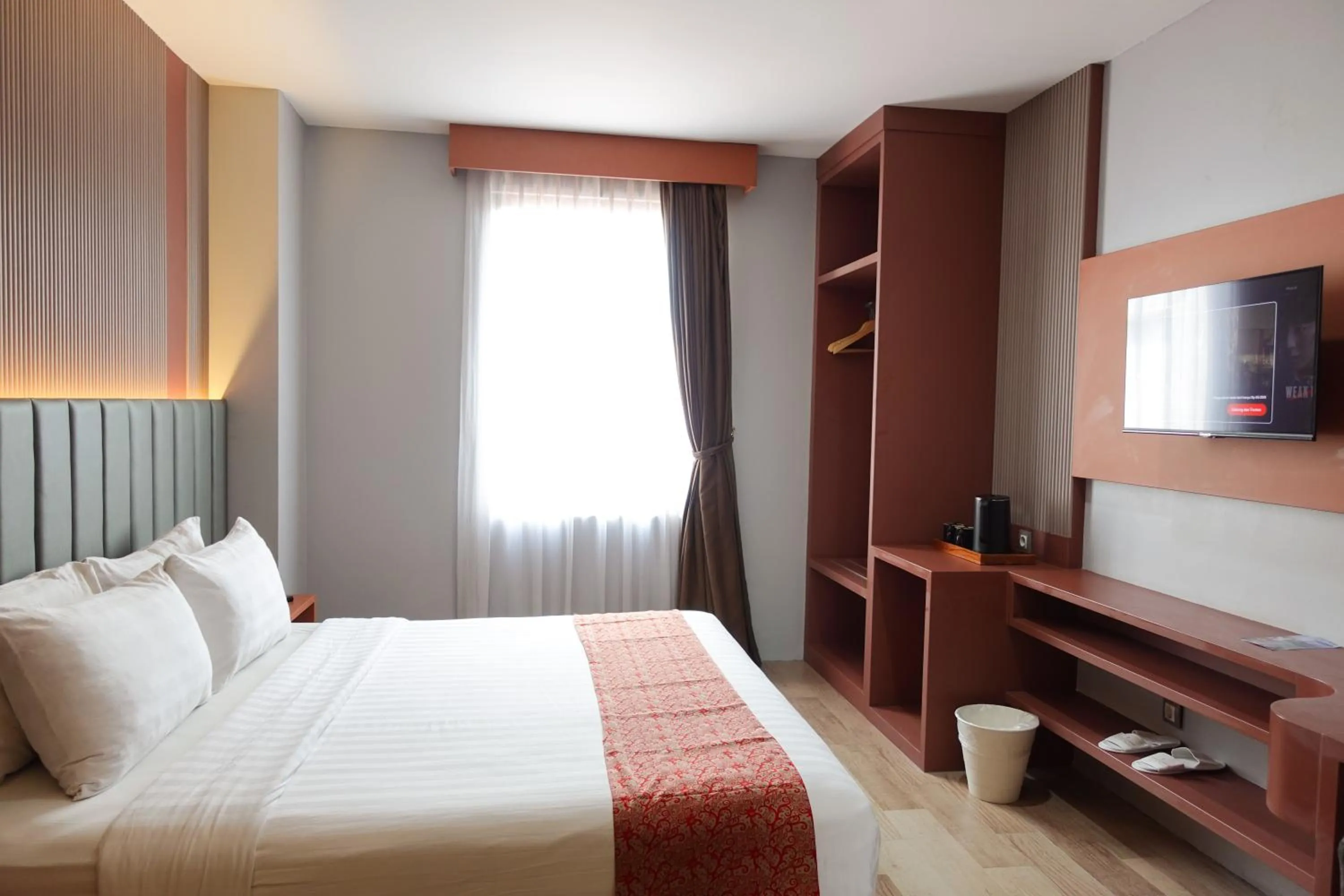 Bedroom, Bed in Grand Kangen Hotel Urip Sumoharjo