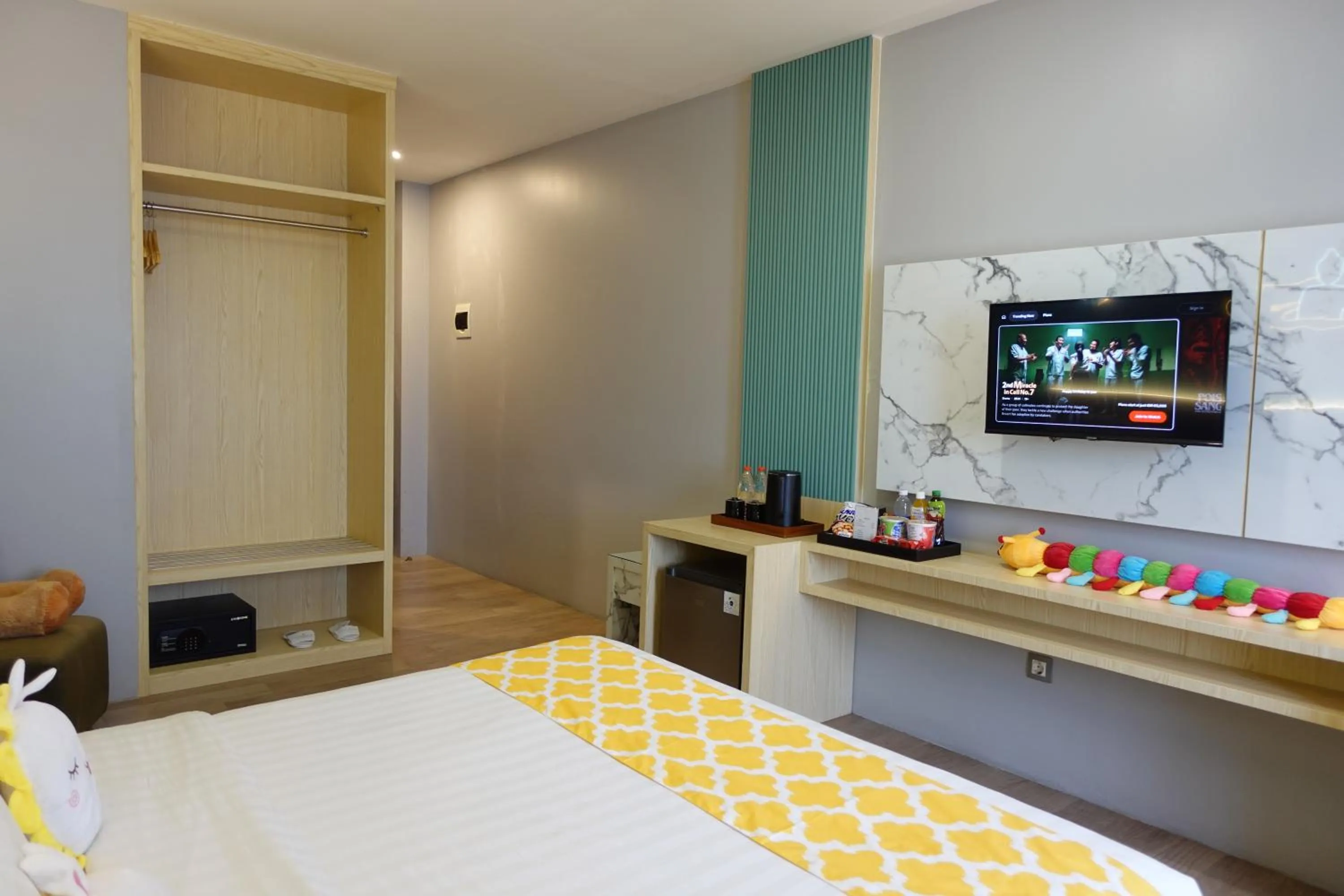 Bed in Grand Kangen Hotel Urip Sumoharjo