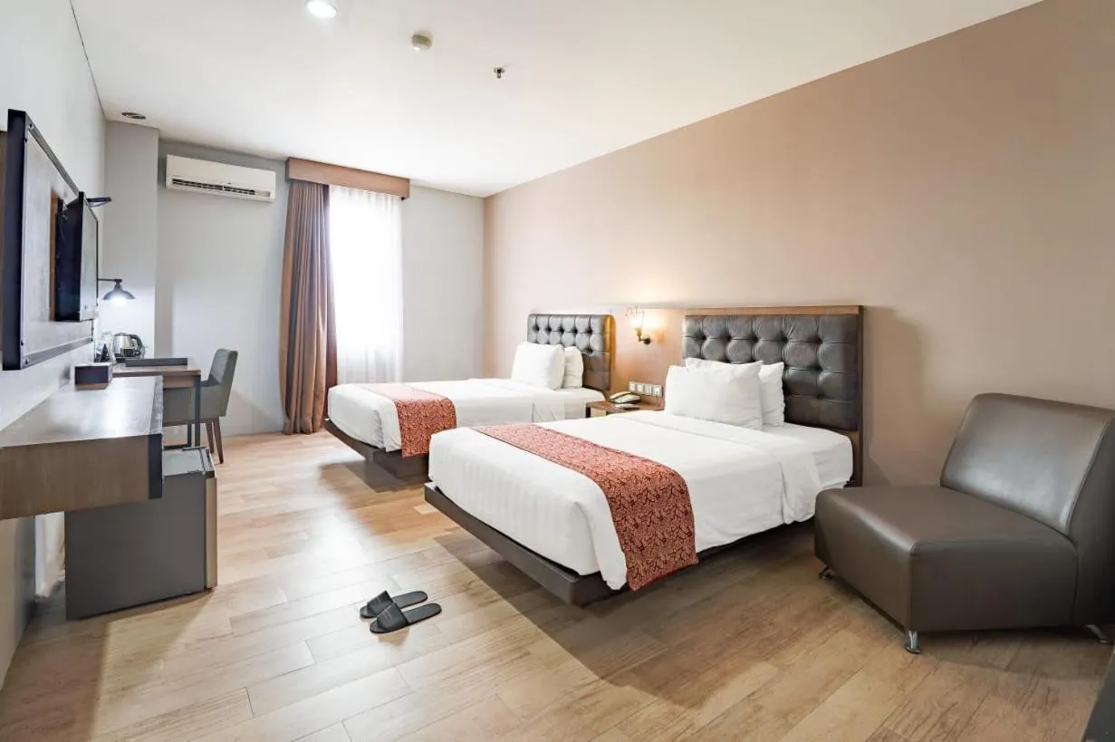 Bedroom, Bed in Grand Kangen Hotel Urip Sumoharjo