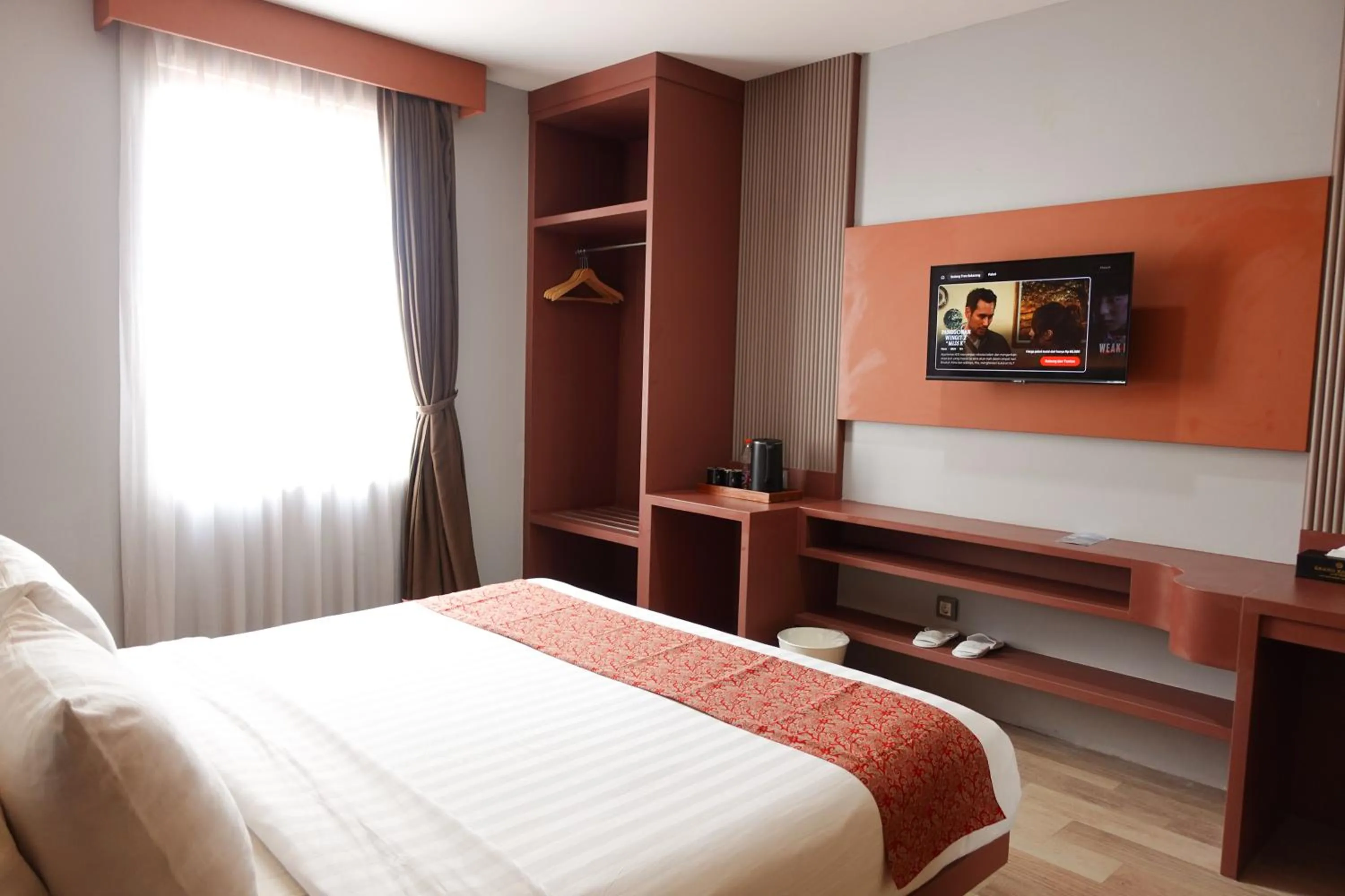 Bedroom, Bed in Grand Kangen Hotel Urip Sumoharjo
