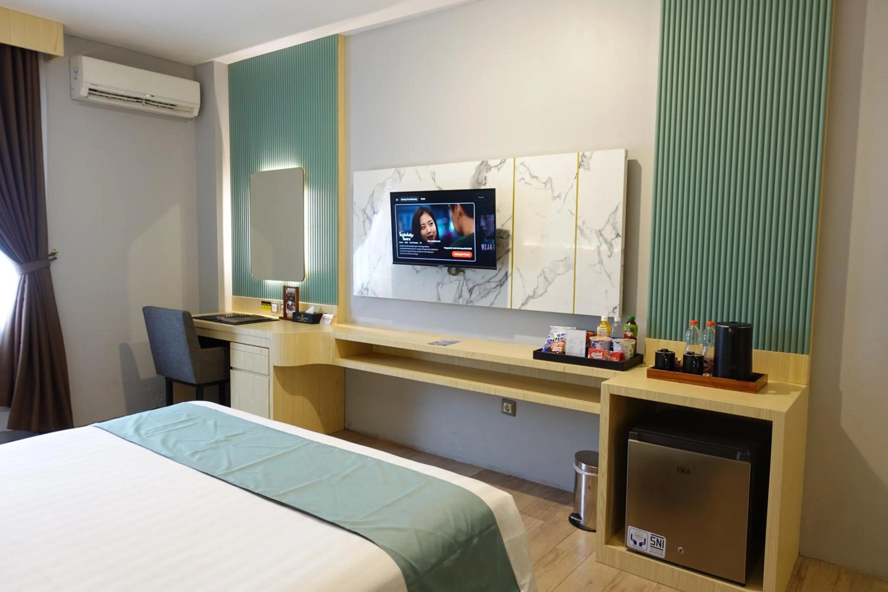 Bedroom, Bed in Grand Kangen Hotel Urip Sumoharjo