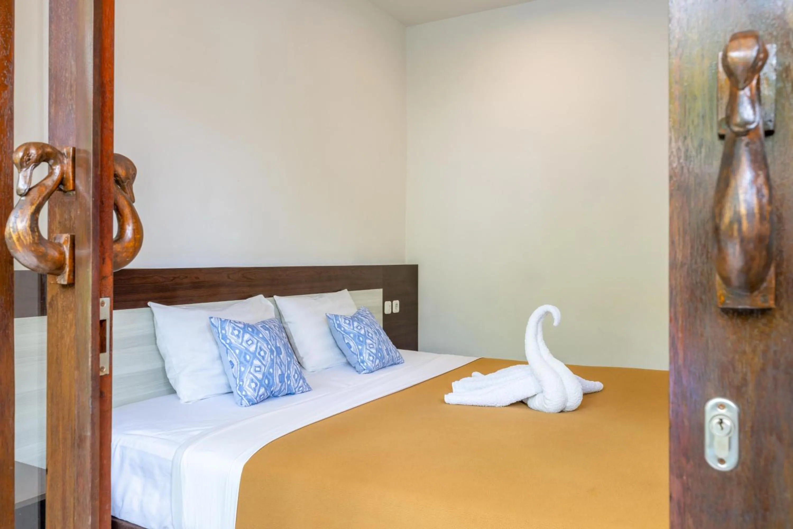 Bed in Dewi Villa Padangbai Hotel