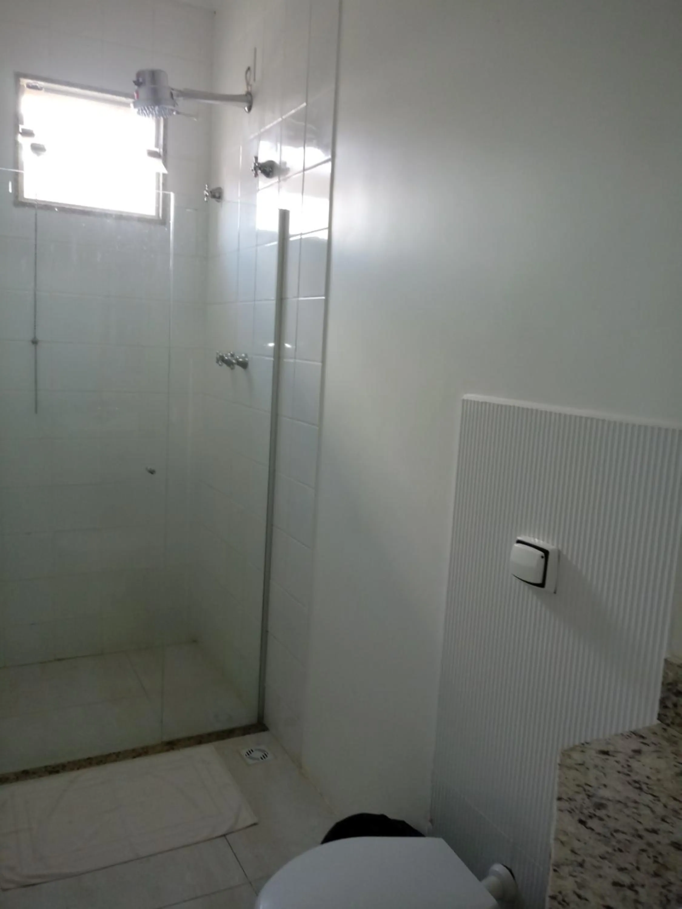 Shower in Aurora Hotel