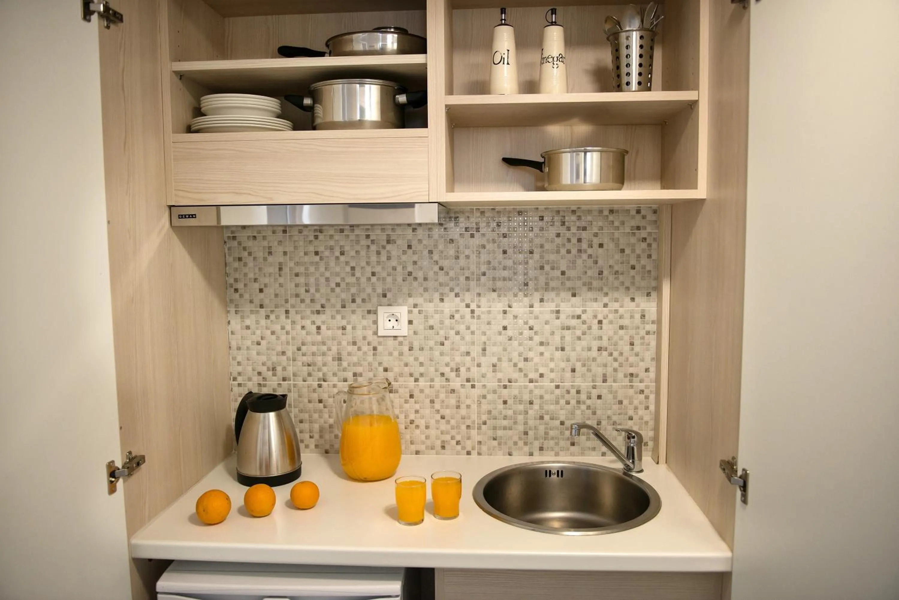 Kitchen or kitchenette in Iperion Beach Hotel