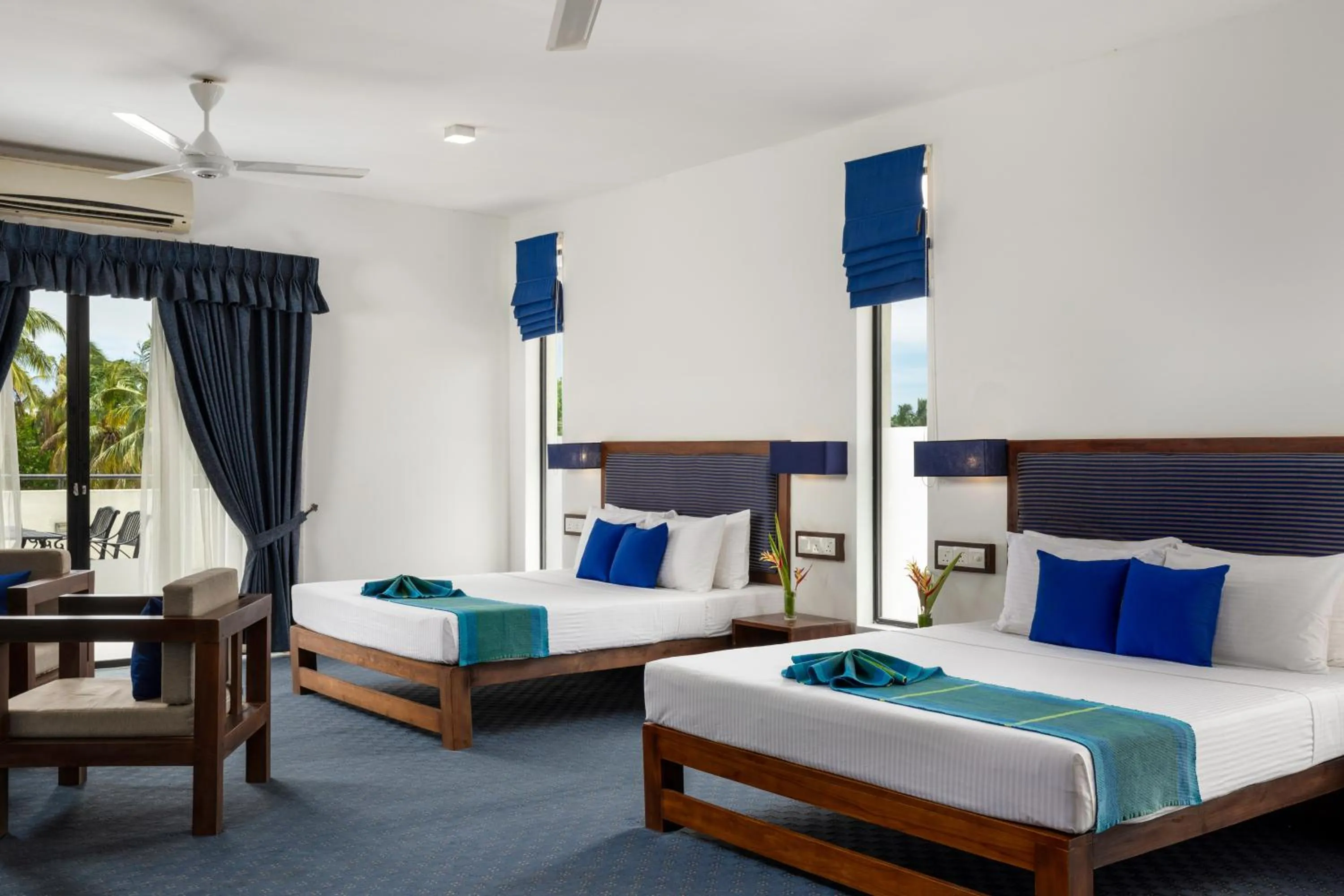 Bed in The Blue Wave Hotel